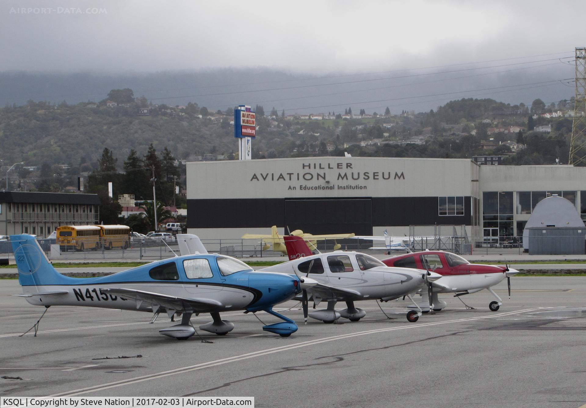 San Carlos Airport (SQL) - Line-up of locally-based Cirrus SR20 + SR22 aircraft @ San Carlos Airport, CA (viewed facing west) 