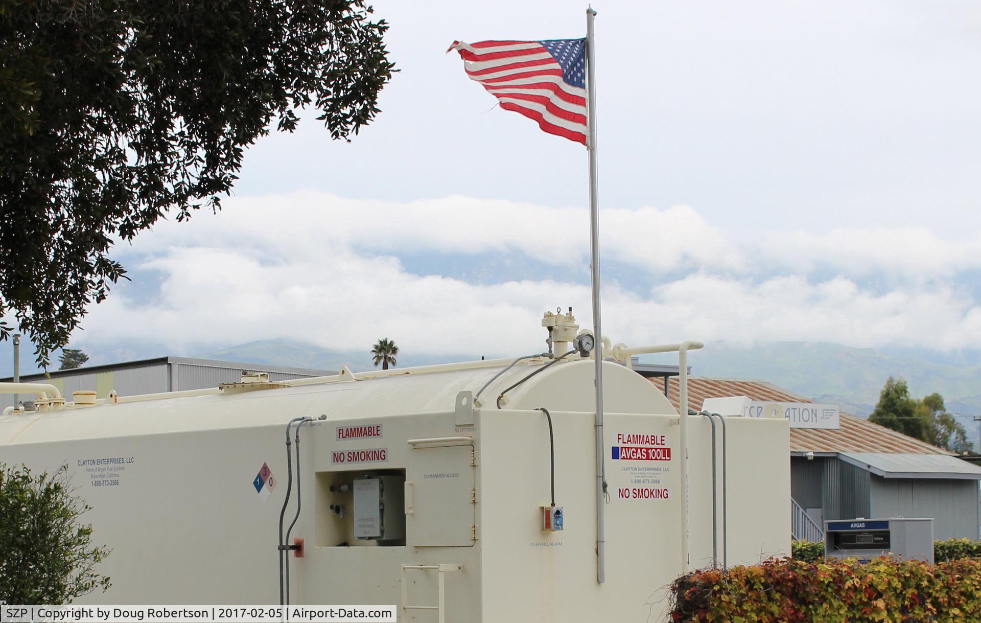 Santa Paula Airport (SZP) - Shifting winds today-Santana building strength forces active runway change to Rwy 04. Note flag at Fuel Dock.