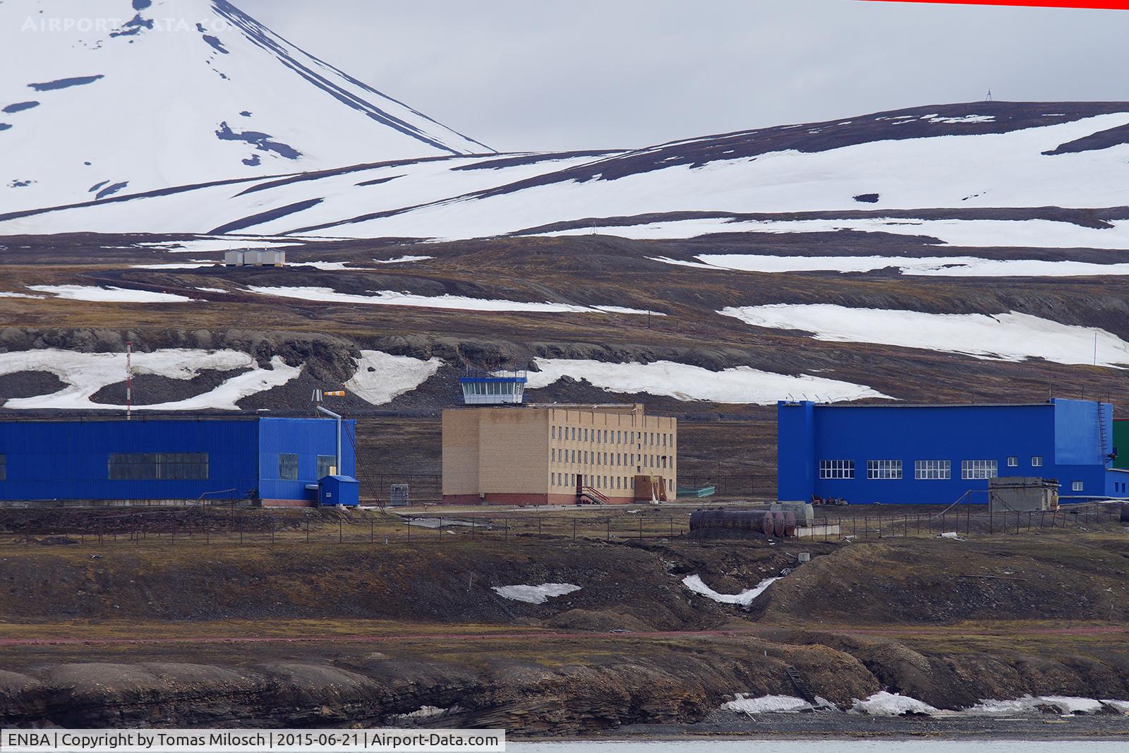 ENBA Airport - The Russian heliport Heerodden (ENBA) in Barentsburg, the second largest settlement on Svalbard, seen from the fjord.