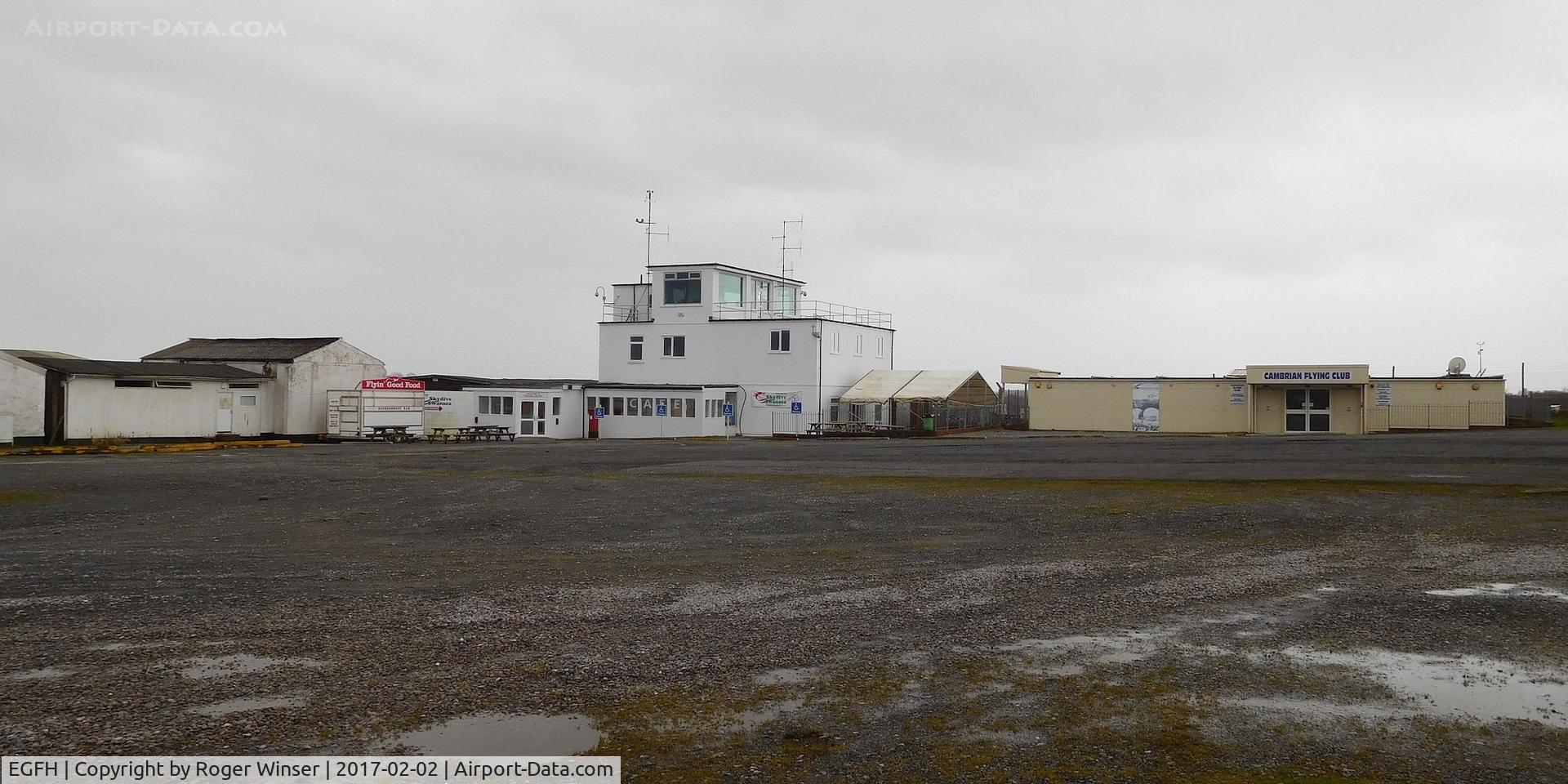 Swansea Airport, Swansea, Wales United Kingdom (EGFH) - The main airport building/control tower and Cambrian House, the home of Cambrian Flying Club.