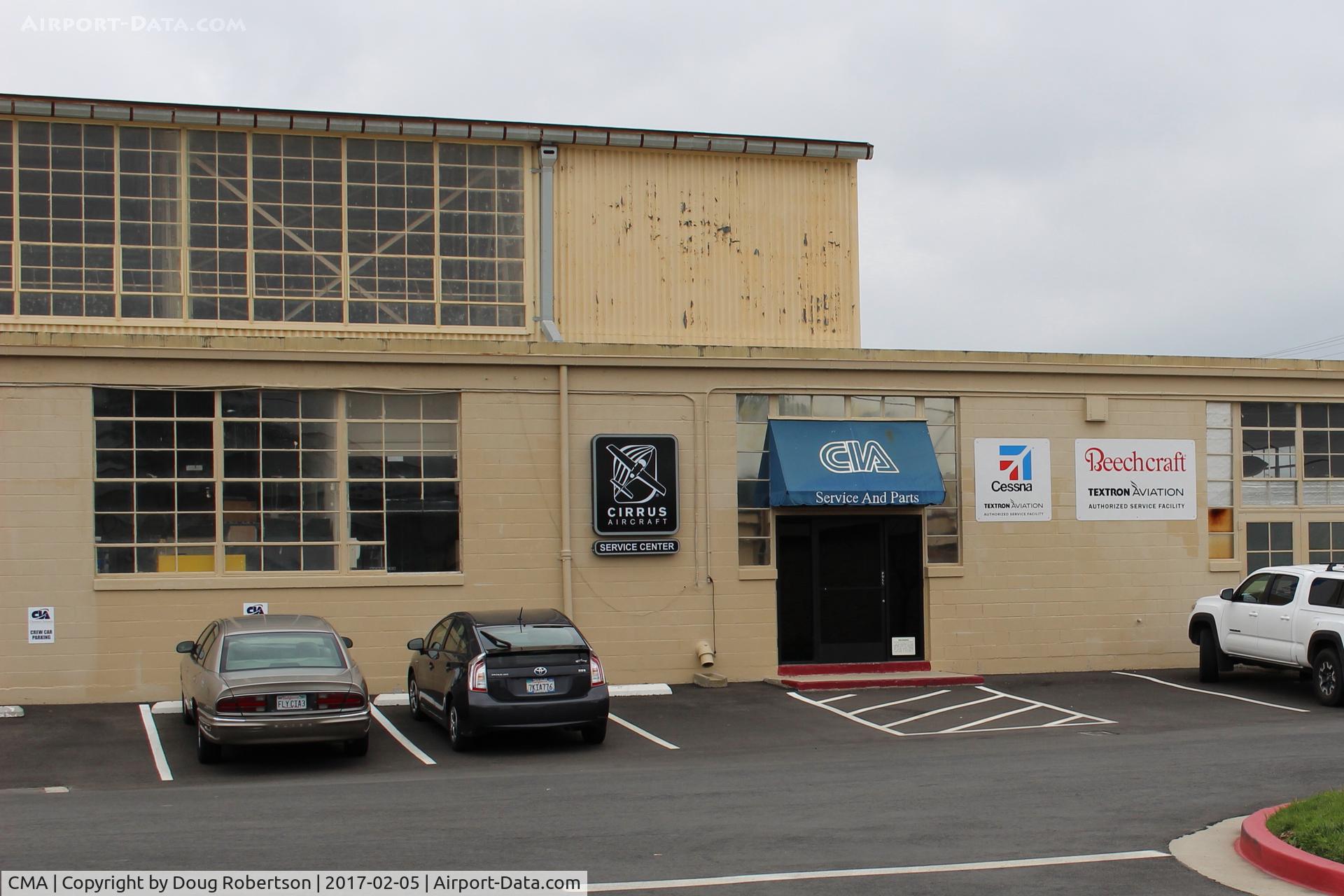 Camarillo Airport (CMA) - Channel Islands Aviation work hangar. This hangar goes back to Oxnard Air Force Base here before Camarillo was a city. Federal GSA gave air base to Ventura County in 1976. USAF base closed 1971. Some USAF bldgs razed. Now new FAA tower.