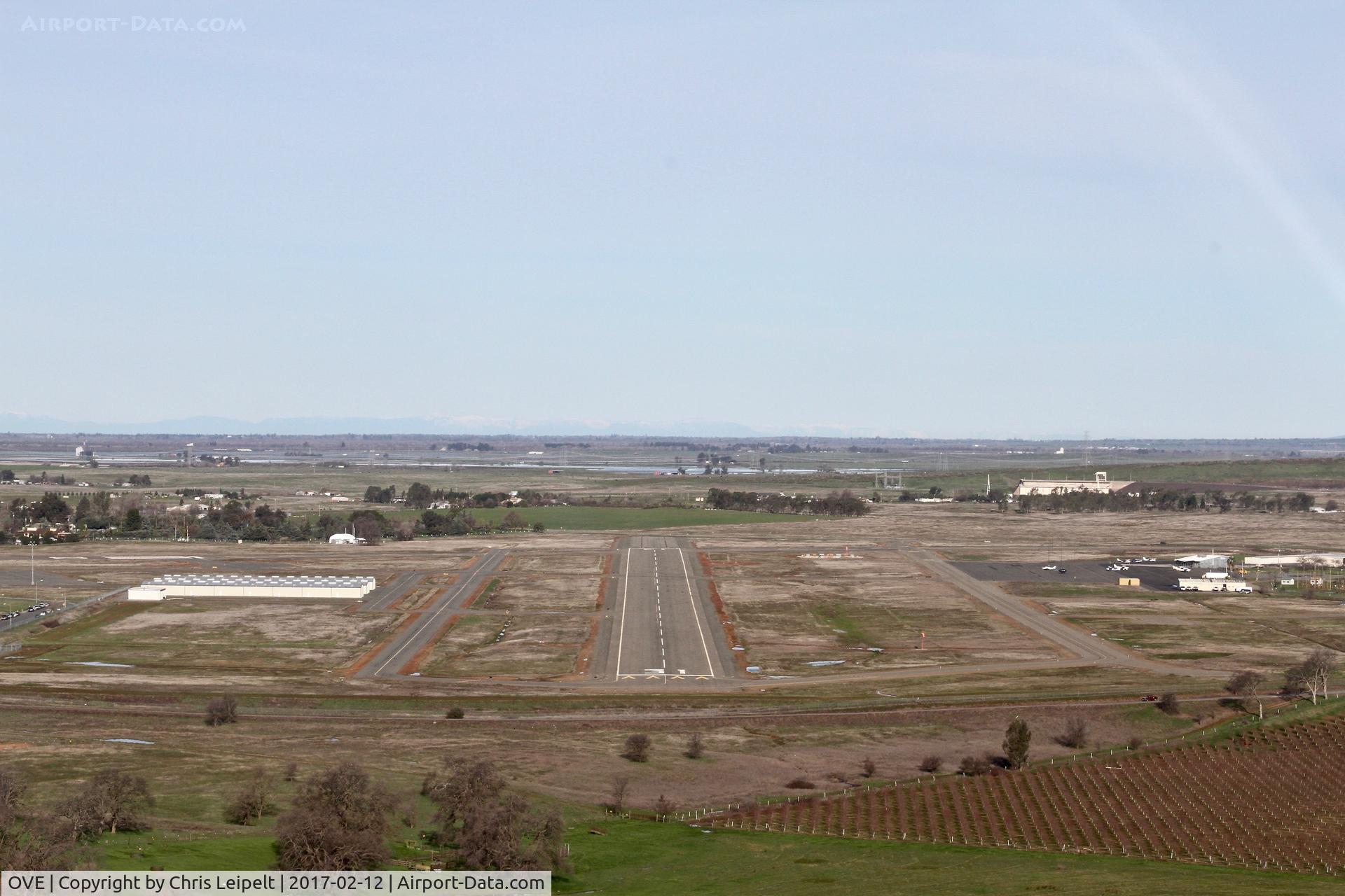 Oroville Municipal Airport (OVE) - On final into Oroville Municipal Airport with waters from the nearby Lake surrounding the airport after the dam incident.