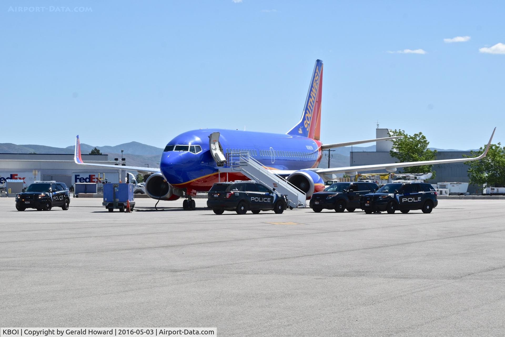 Boise Air Terminal/gowen Fld Airport (BOI) - Airport K-9s training on empty Southwest jet parked on remote spot #1.