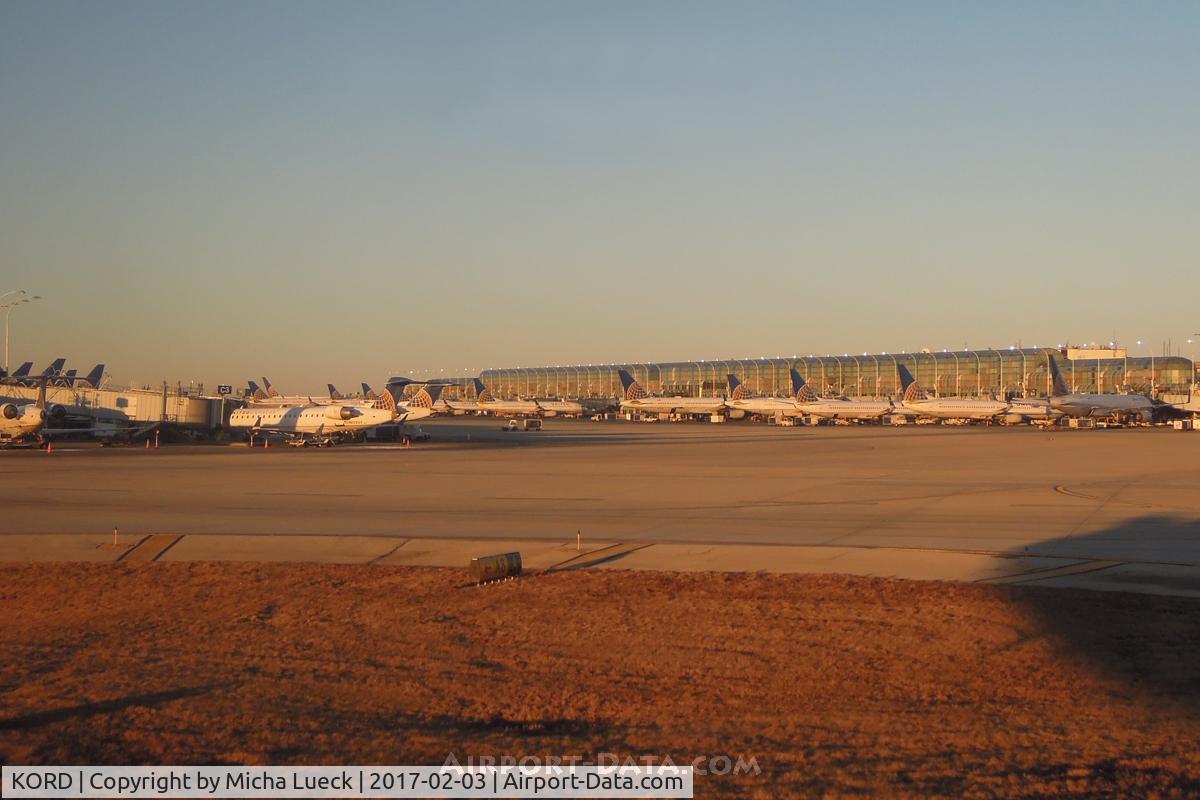 Chicago O'hare International Airport (ORD) - Evening sun shining on the UA fortress