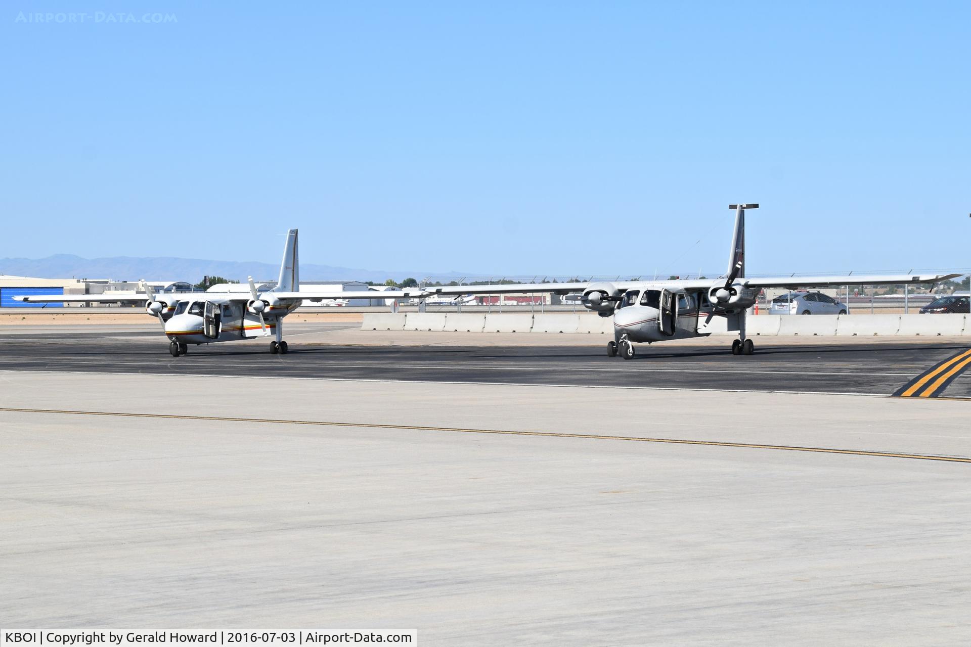 Boise Air Terminal/gowen Fld Airport (BOI) - Two Islanders parked on the back country ramp (Gate 58) awaiting passengers.
