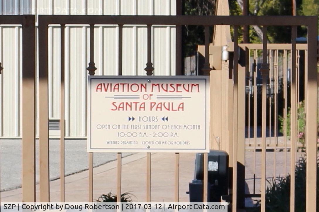 Santa Paula Airport (SZP) - Aviation Museum of Santa Paula-Days, Hours of Open House most First Sundays. This gate at airport entry parking lot otherwise locked.