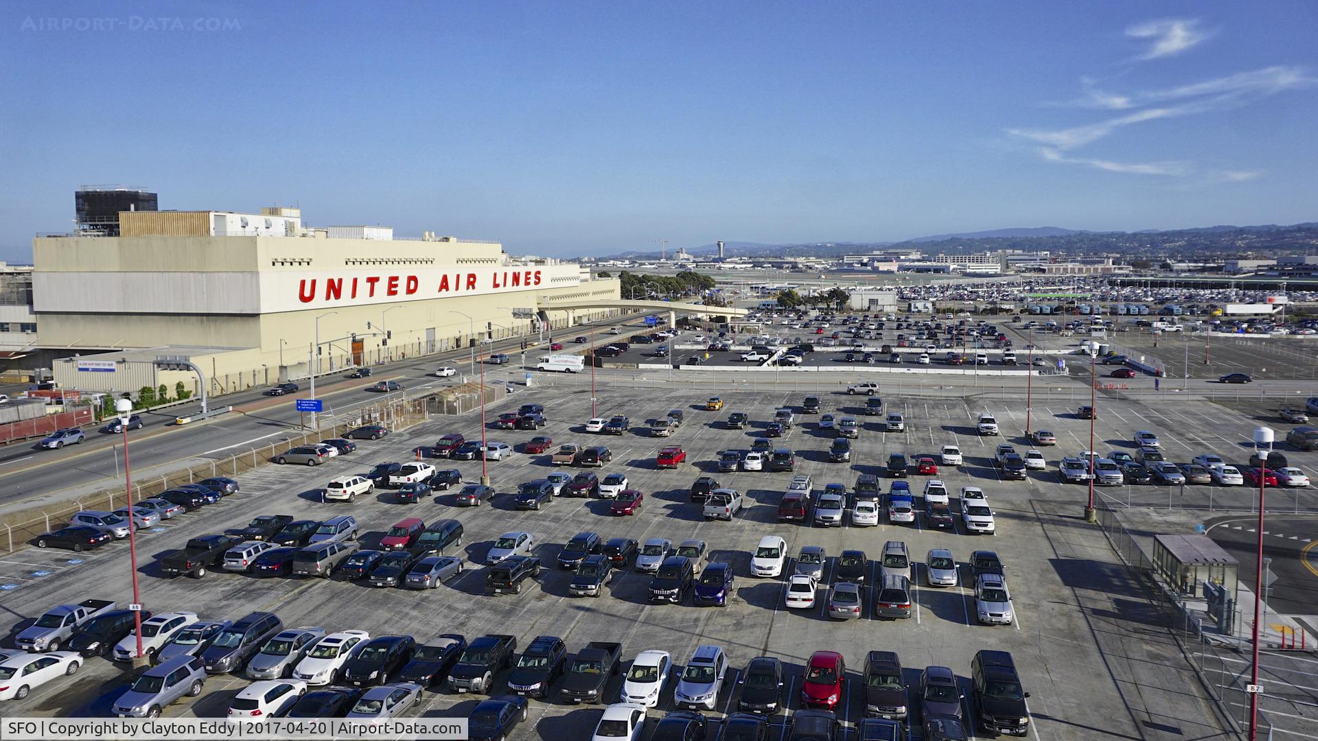 San Francisco International Airport (SFO) - United Airlines maintenance base, and the dismantling of the old ATC towers in the background. 2017.