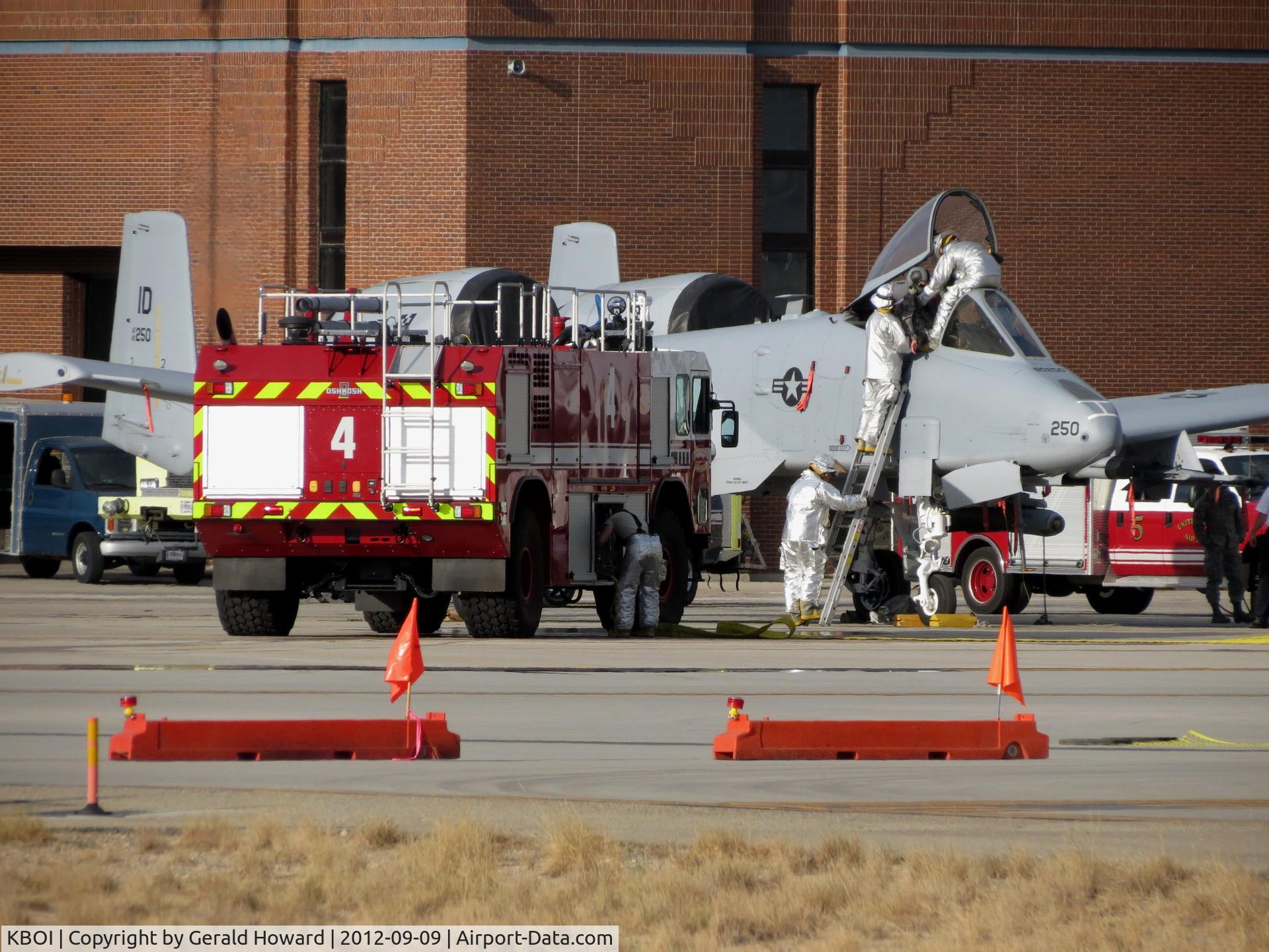 Boise Air Terminal/gowen Fld Airport (BOI) - Idaho ANG fire fighter practice a rescue on an A-10 pilot.
