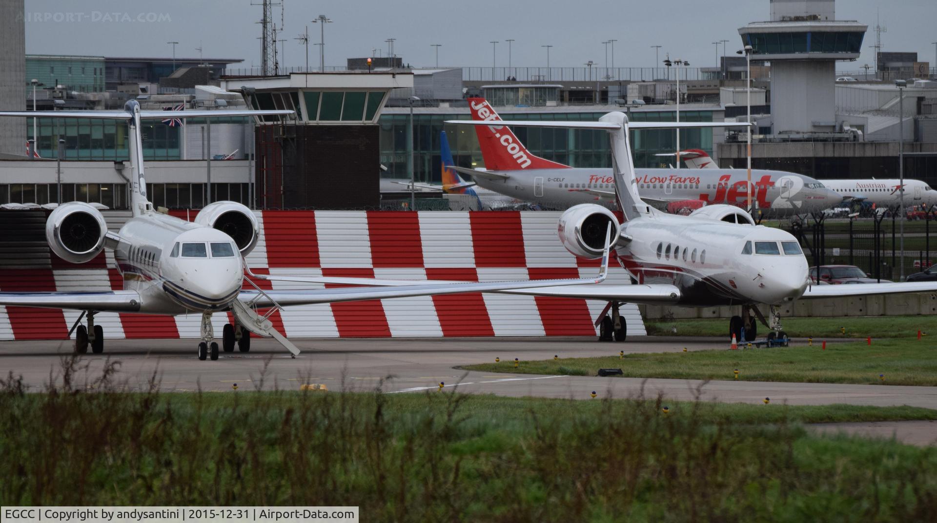 Manchester Airport, Manchester, England United Kingdom (EGCC) - two gulfs parked up on the [FBO exc ramp]