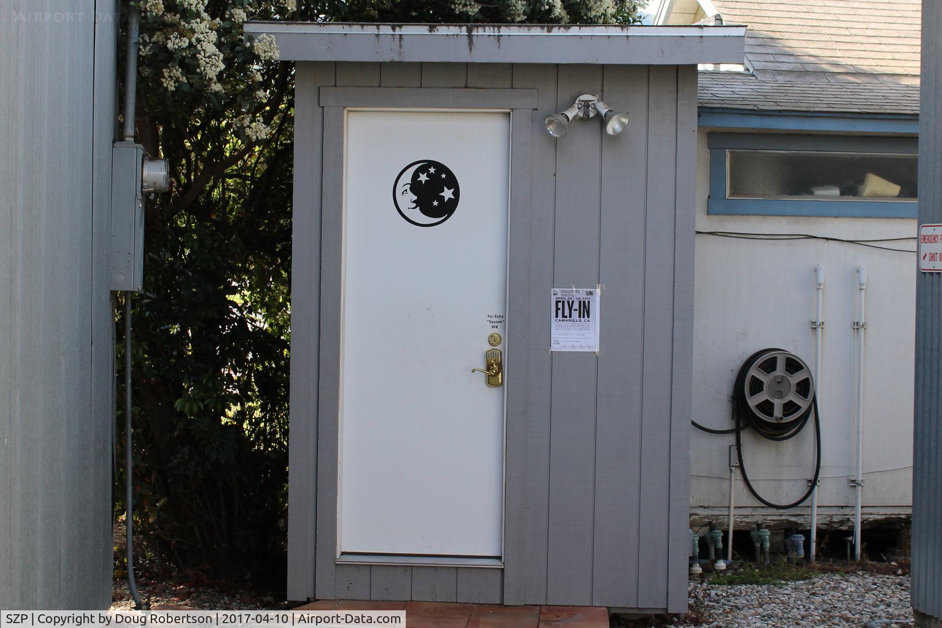 Santa Paula Airport (SZP) - Closest toilet/washroom to the SZP Flight Line. Go through the small Airport Park to behind the Airport Office, Squack VFR on door's keypad to enter. If that does not work-it means occupant has double  locked the door for privacy.