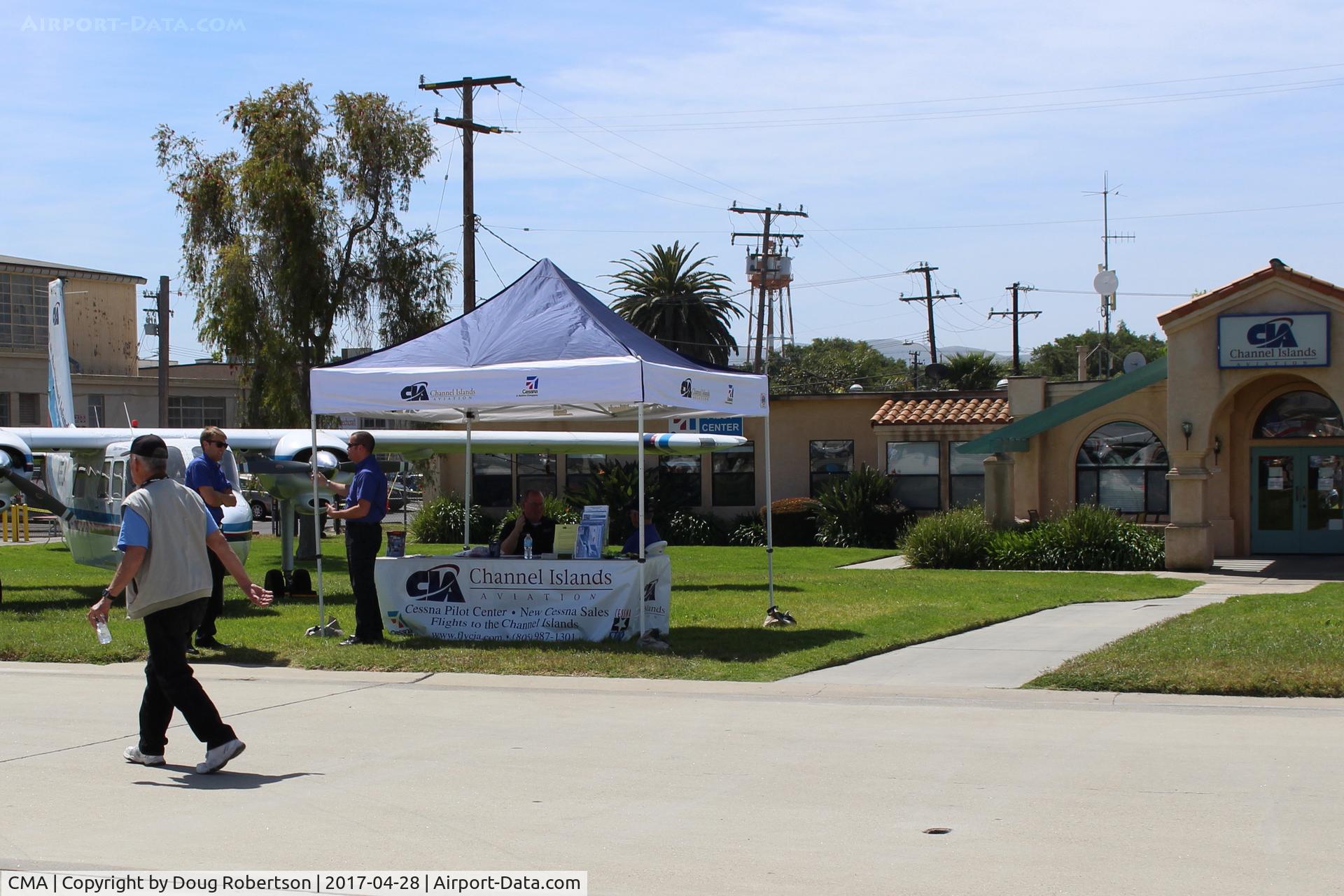 Camarillo Airport (CMA) - Channel Islands Aviation Display Tent, Cessna Dealer/FBO since 1976. at AOPA FLY-In.