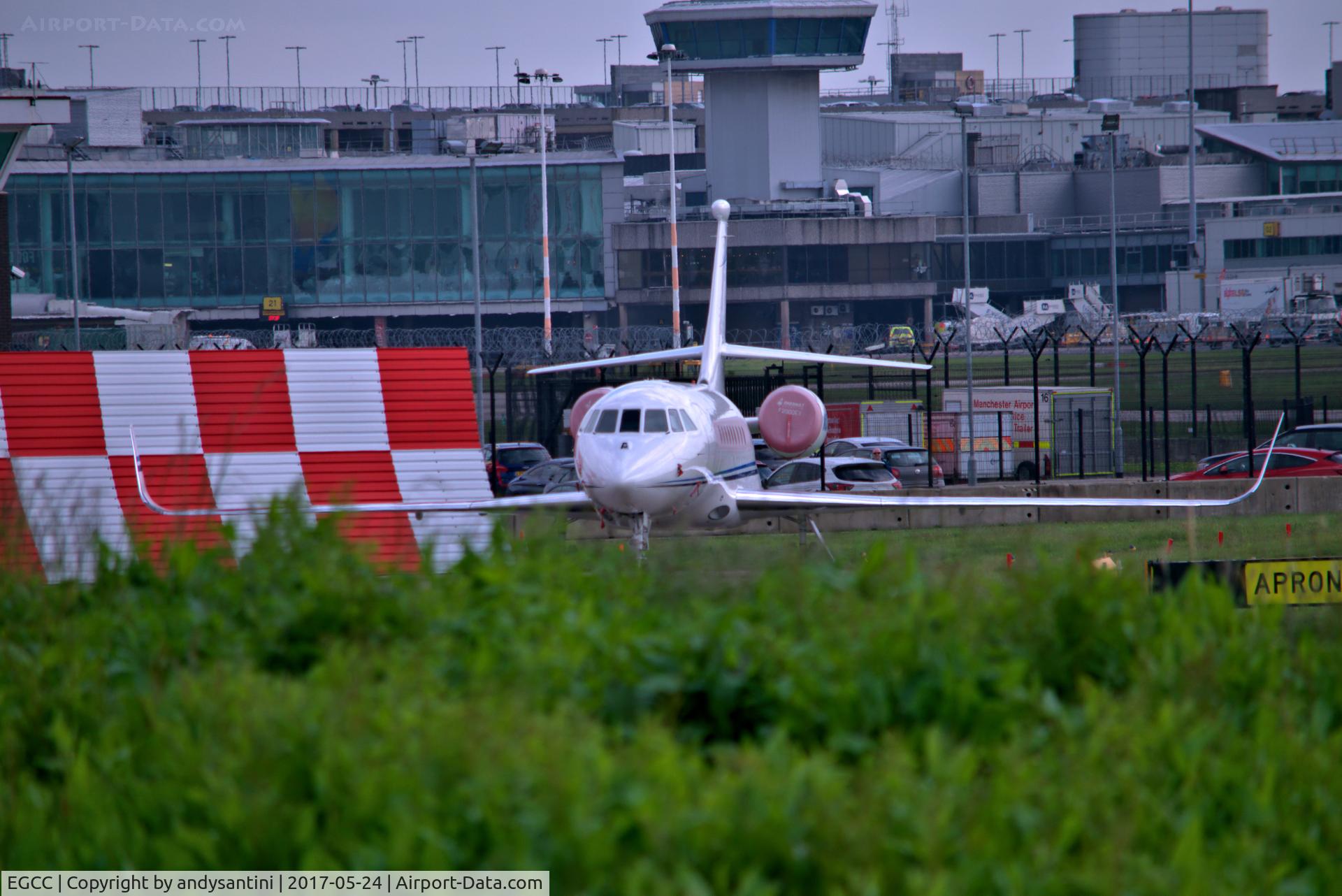 Manchester Airport, Manchester, England United Kingdom (EGCC) - unknown corp jet parked up on the FBO exc ramp [man egcc uk]
