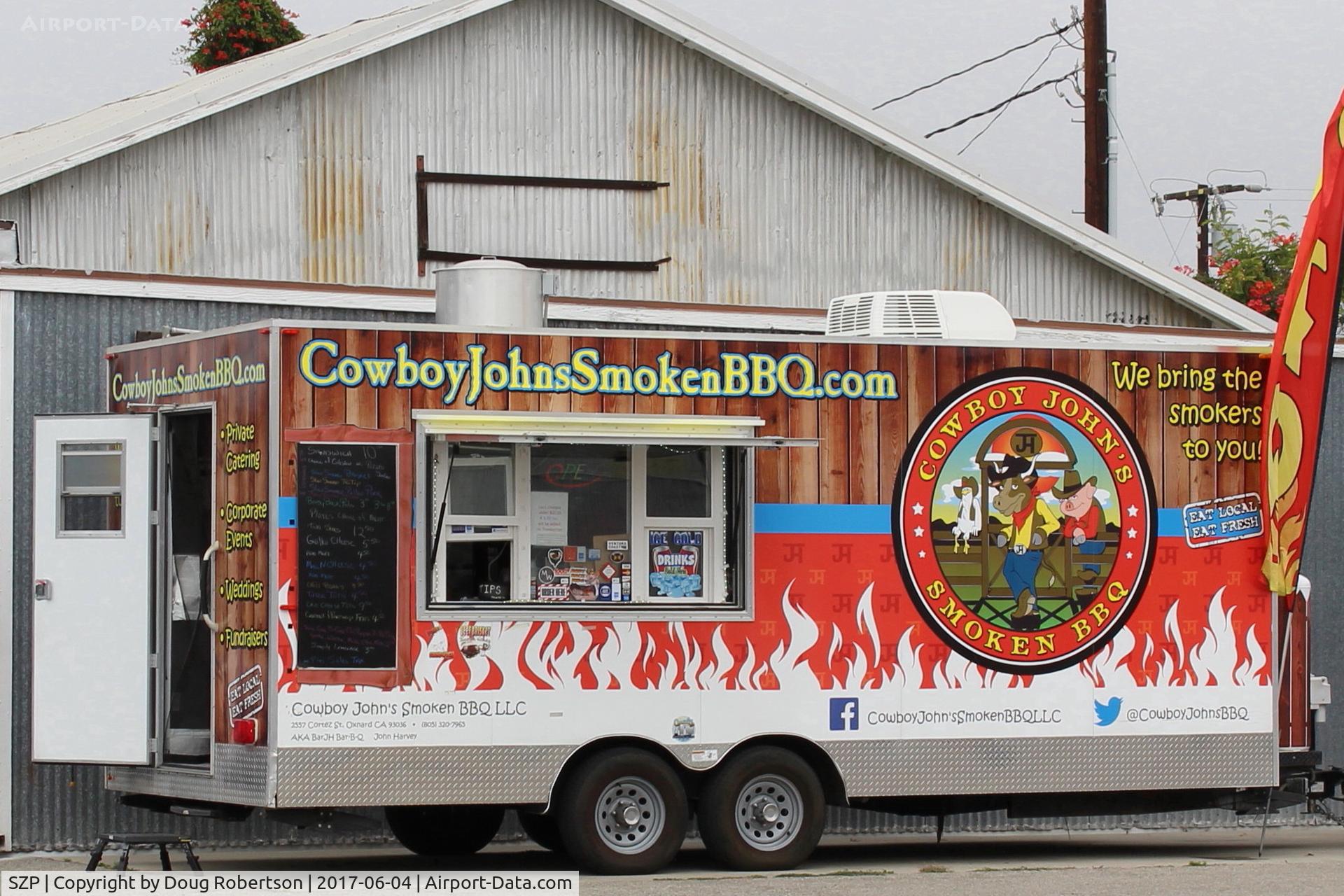 Santa Paula Airport (SZP) - Various food truck contractors are invited to feed the Aviation Museum crowds in addition to the open airport restaurant. This is a typical portable food truck setting up early on site.