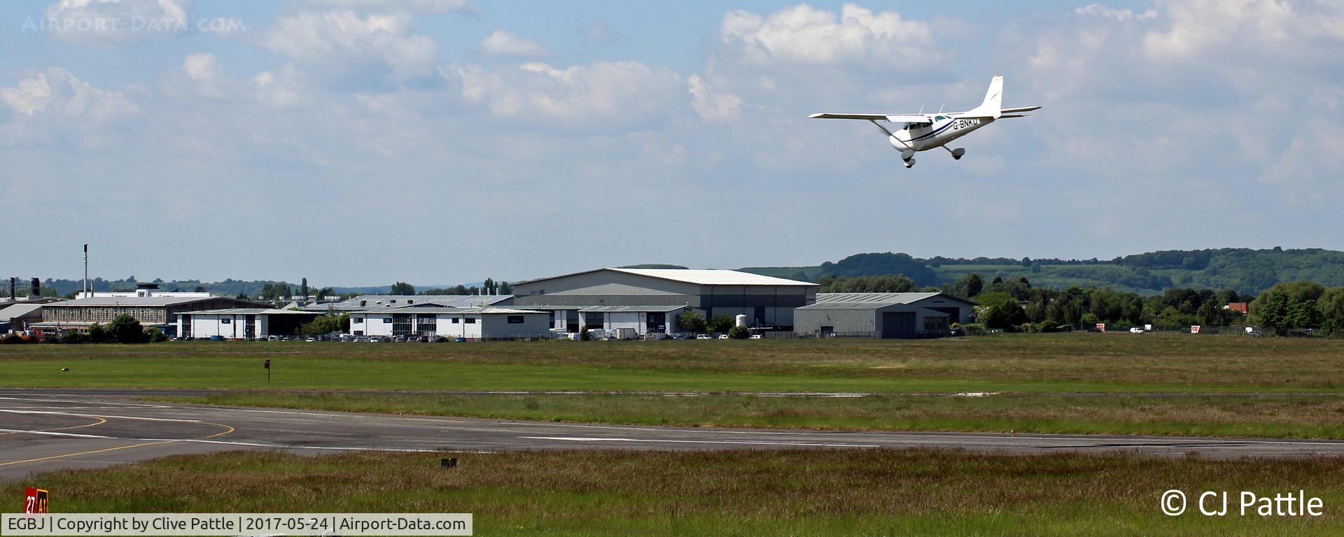 Gloucestershire Airport, Staverton, England United Kingdom (EGBJ) - Airfield view at Gloucester/Staverton - Jet Age Museum in the background.