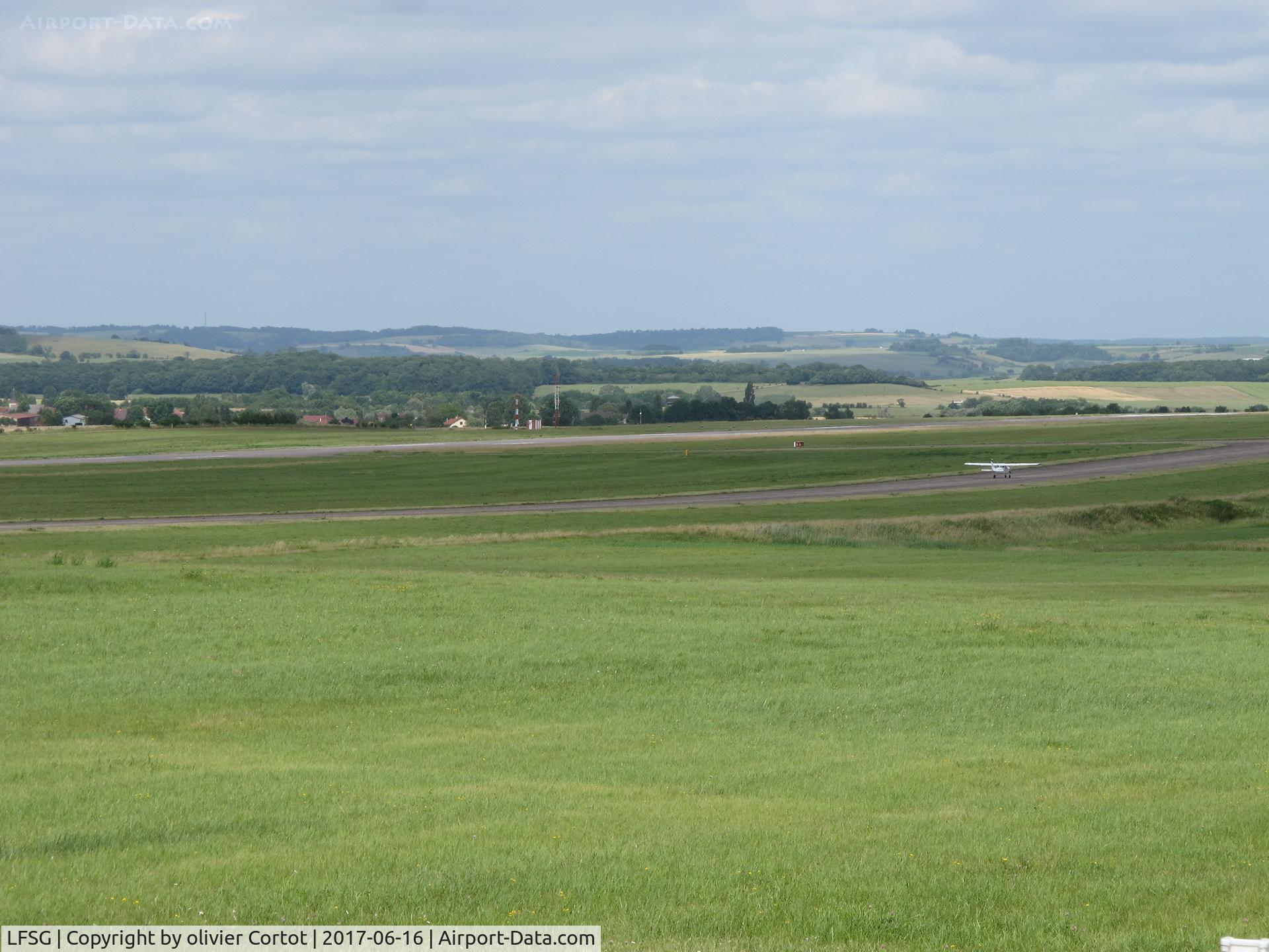 Épinal Mirecourt Airport, Épinal France (LFSG) - the taxiway and the runway on the left. Mirecourt is an ex NATO military airfield