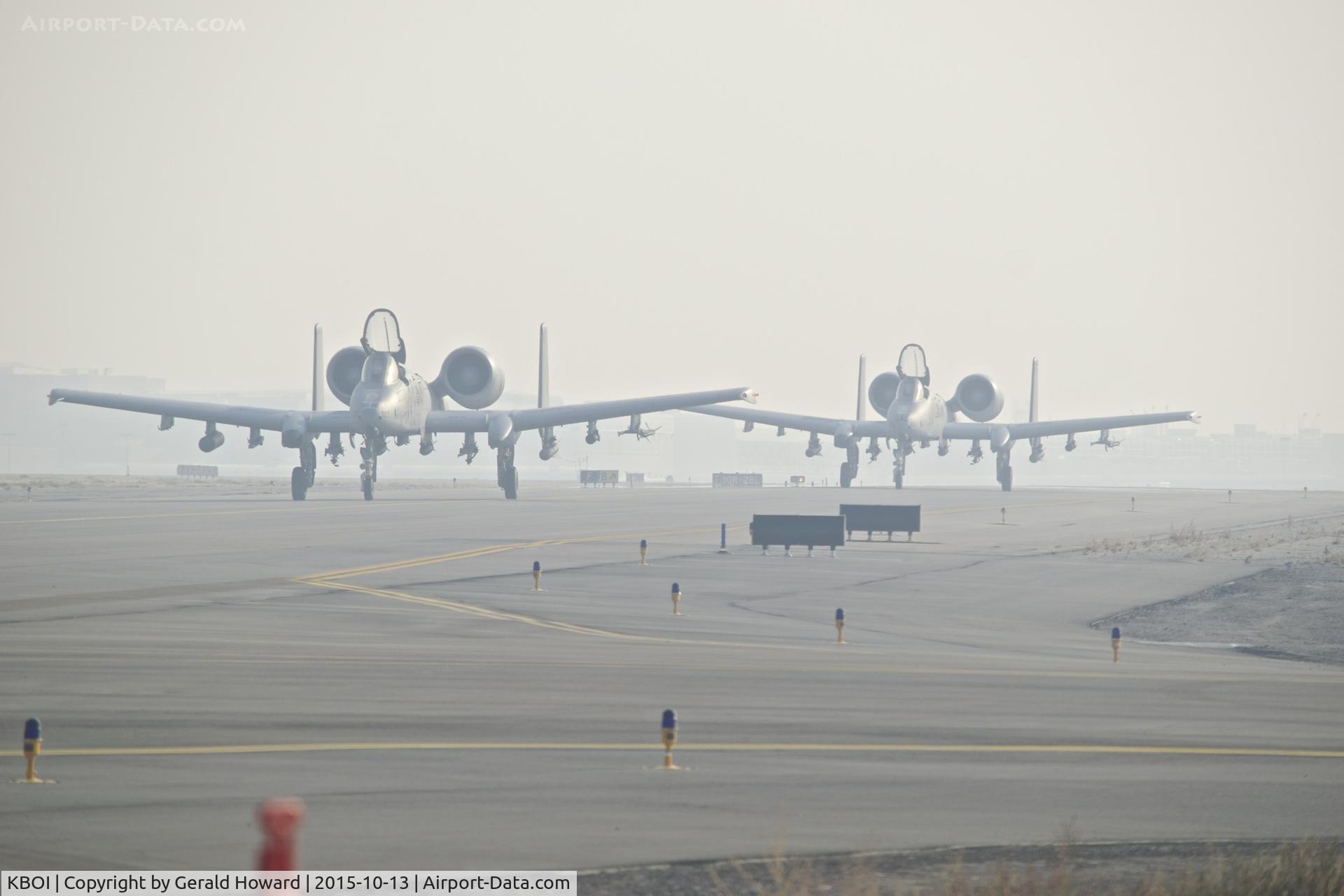 Boise Air Terminal/gowen Fld Airport (BOI) - A-10s on Foxtrot headed for the west arm/de arm pad. Smoke filled day.