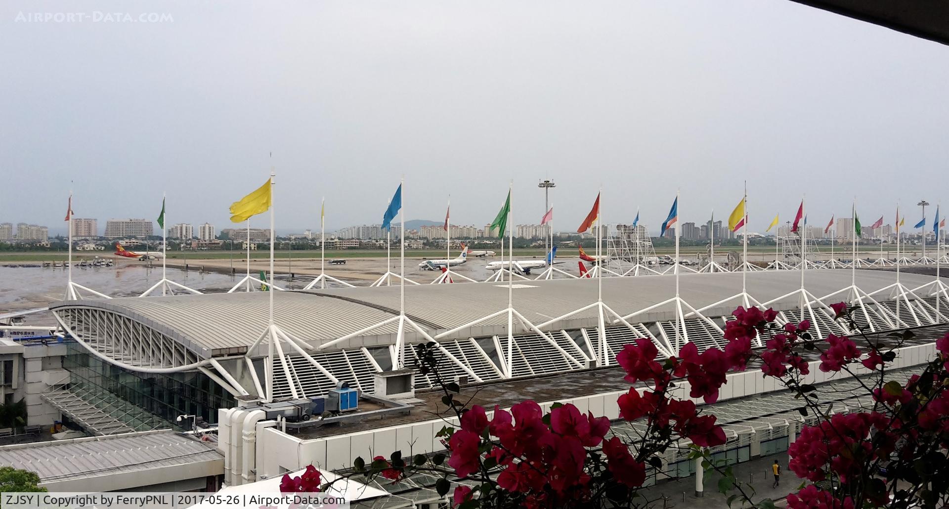 ZJSY Airport - Sanya (SYX/ZJSY) termimal and apron  seen from the car park.