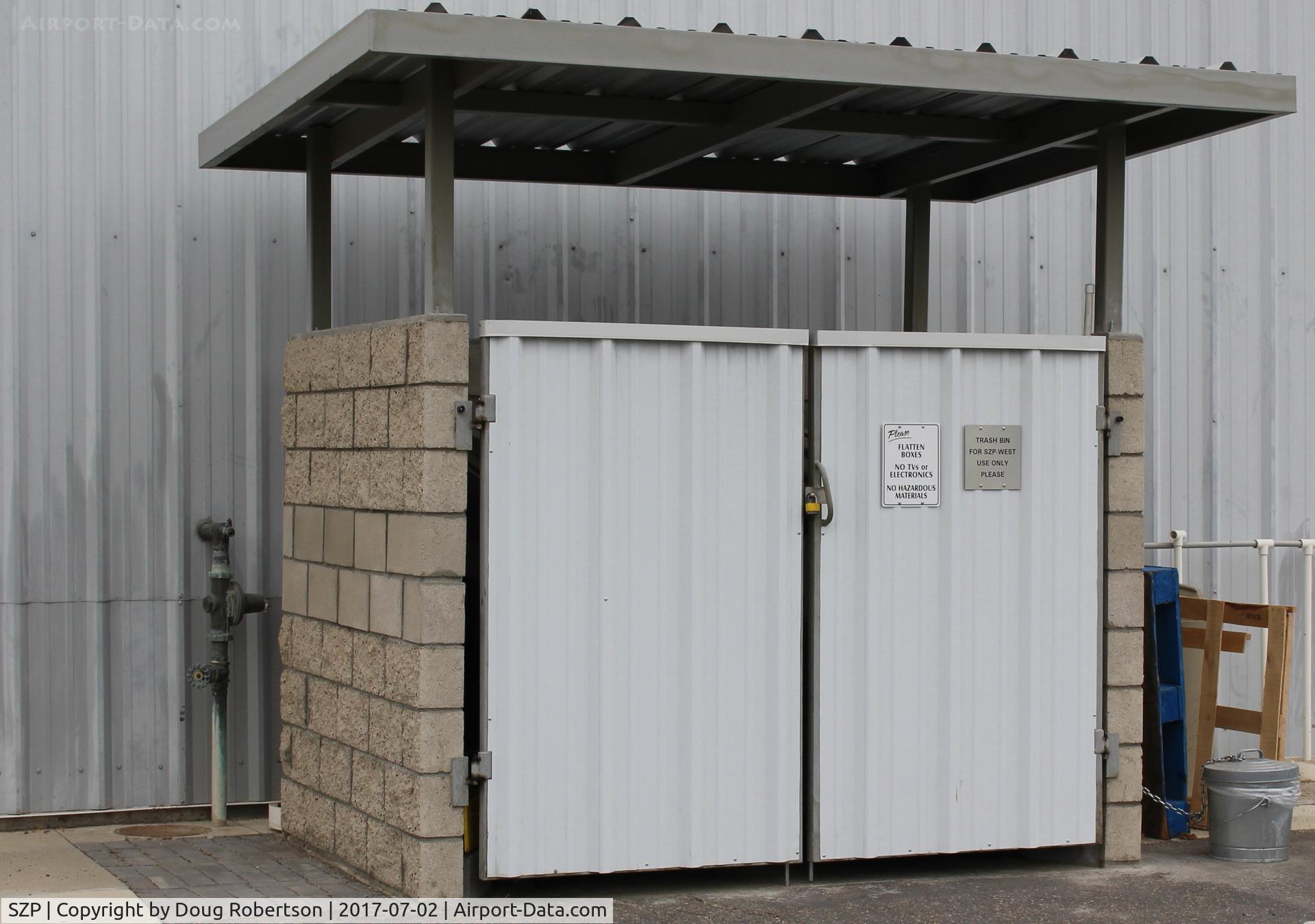 Santa Paula Airport (SZP) - Locked waste containers serving newer west section airport hangars.