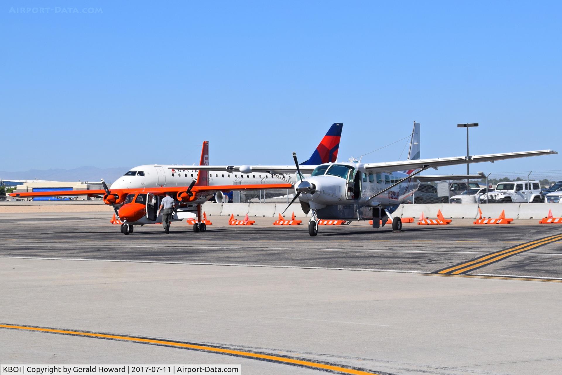 Boise Air Terminal/gowen Fld Airport (BOI) - Islander & Caravan parked on the back country ramp to transport passengers into the mountains.