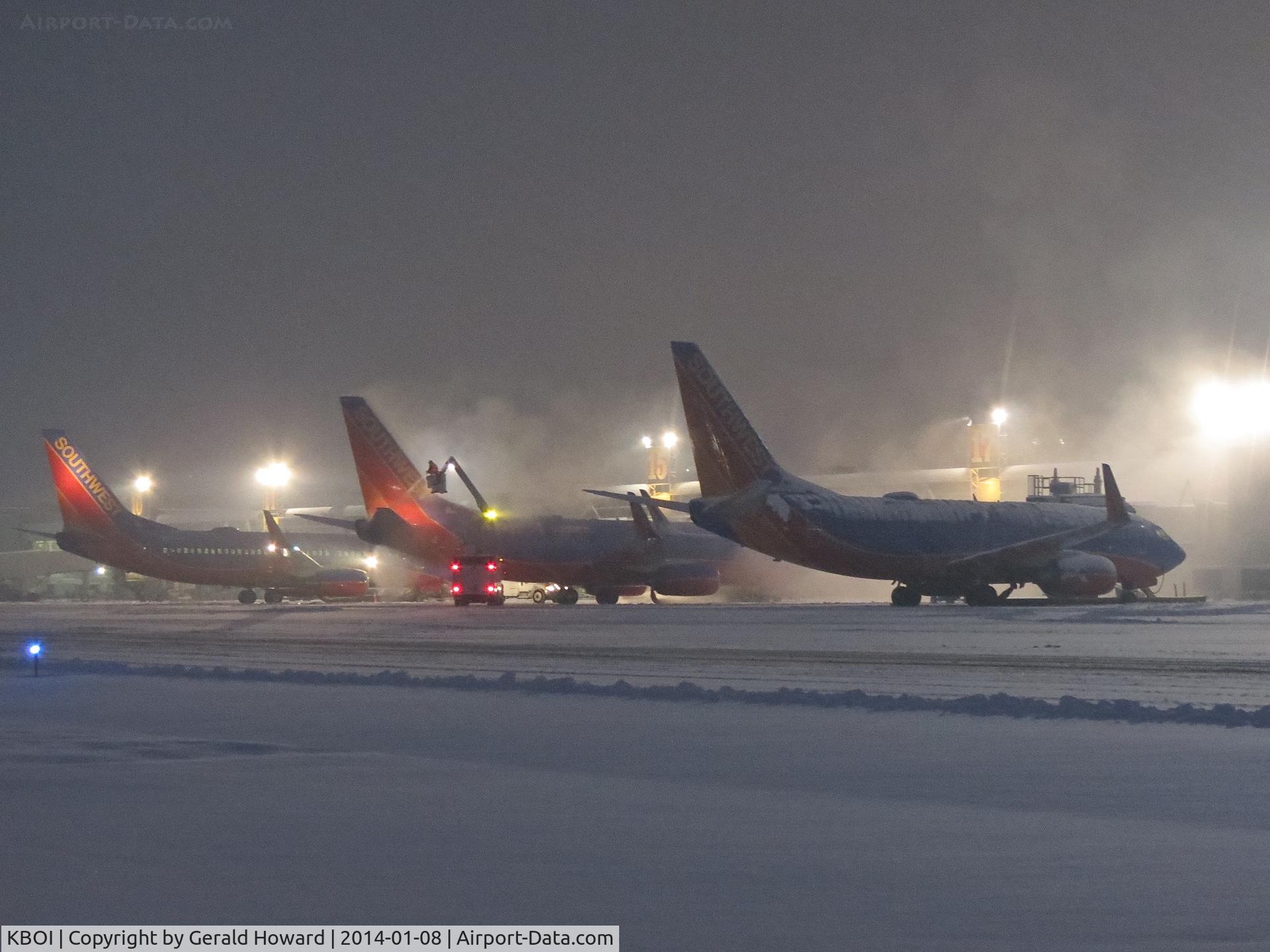 Boise Air Terminal/gowen Fld Airport (BOI) - 3 Southwest jets getting an early morning de ice.