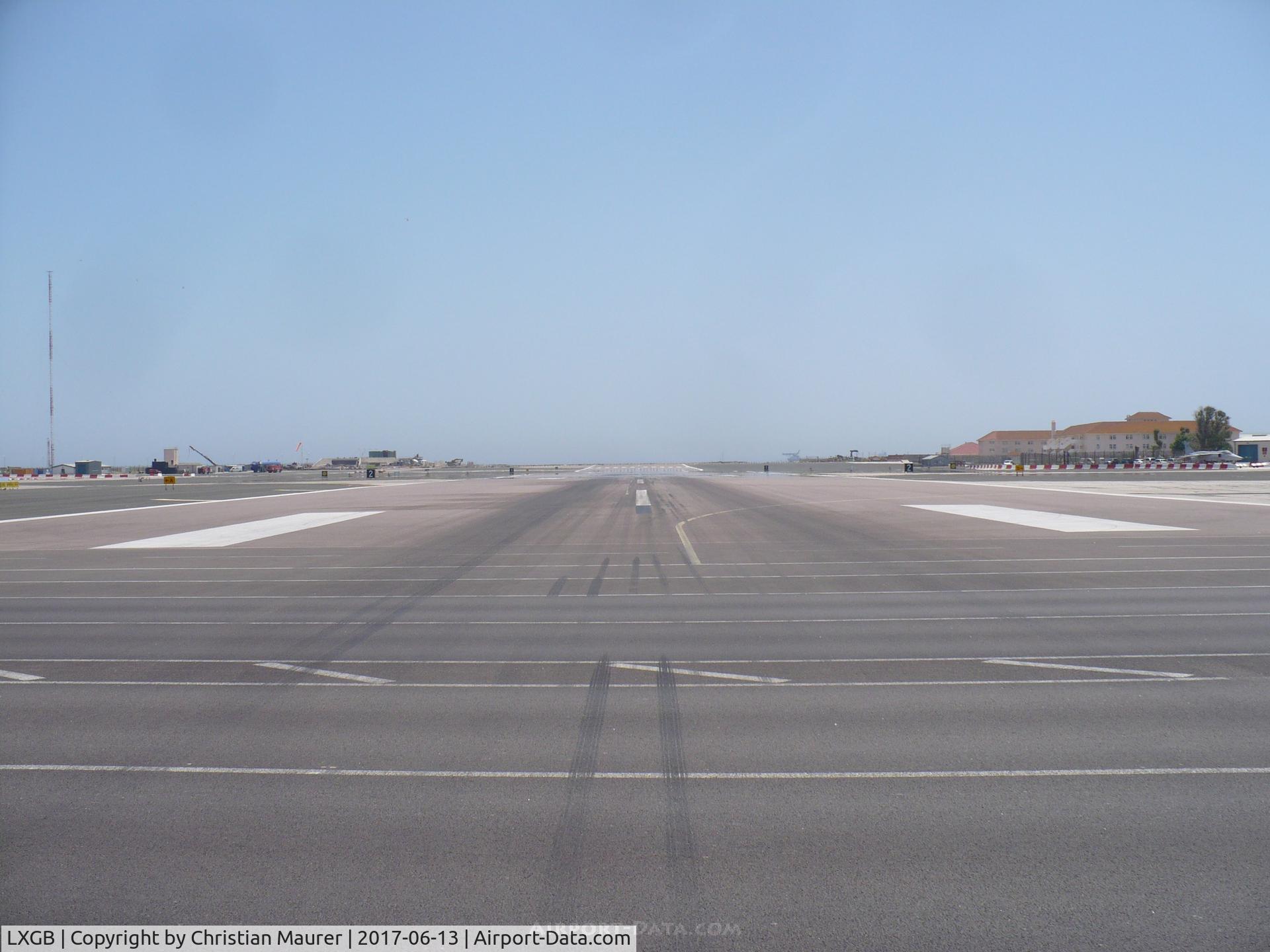 Gibraltar Airport, Gibraltar Gibraltar (LXGB) - Gibraltar's famous Runway Crossing