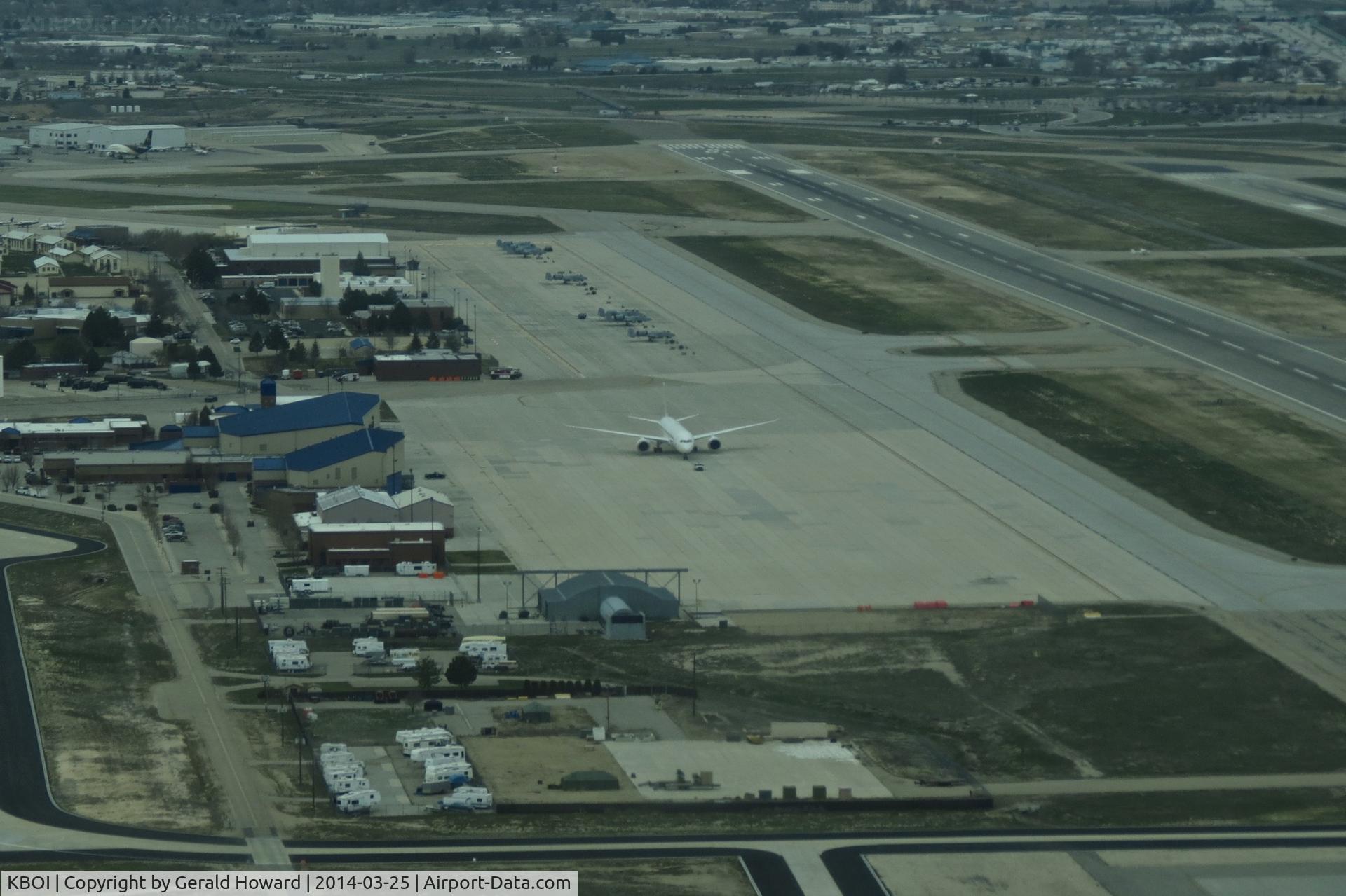 Boise Air Terminal/gowen Fld Airport (BOI) - Looking at the Idaho ANG ramp on the south side of BOI. A-10Cs are on the west side and a new Boeing 787 is parked where the C-130s used to be.