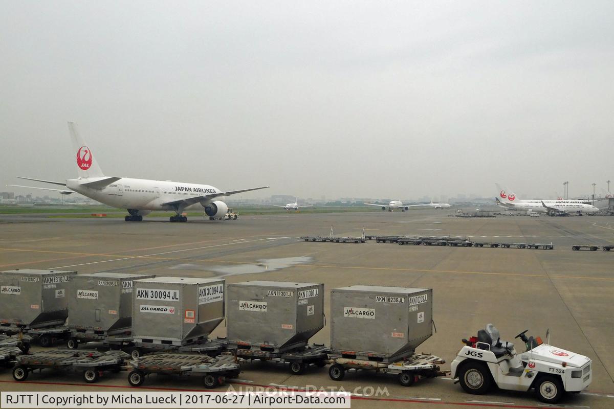 Tokyo International Airport (Haneda), Ota, Tokyo Japan (RJTT) - A grey morning, but Haneda is busy as ever...