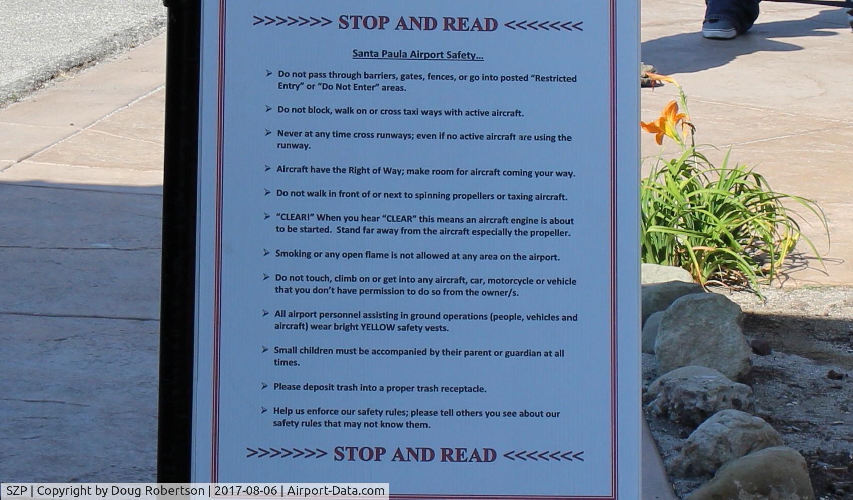 Santa Paula Airport (SZP) - Santa Paula Airport Pedestrian Safety Rules. Please read large. Posted near Aviation Museum of Santa Paula entryway.