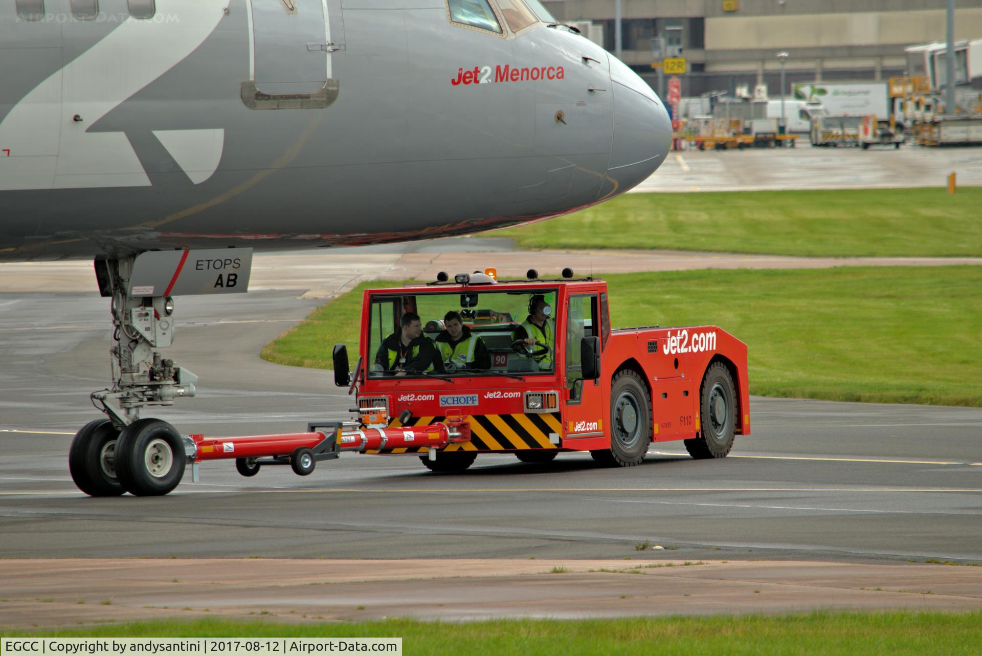 Manchester Airport, Manchester, England United Kingdom (EGCC) - JET2 aircraft tug pulling G-LSAB B757 back to the JET2 hanger
