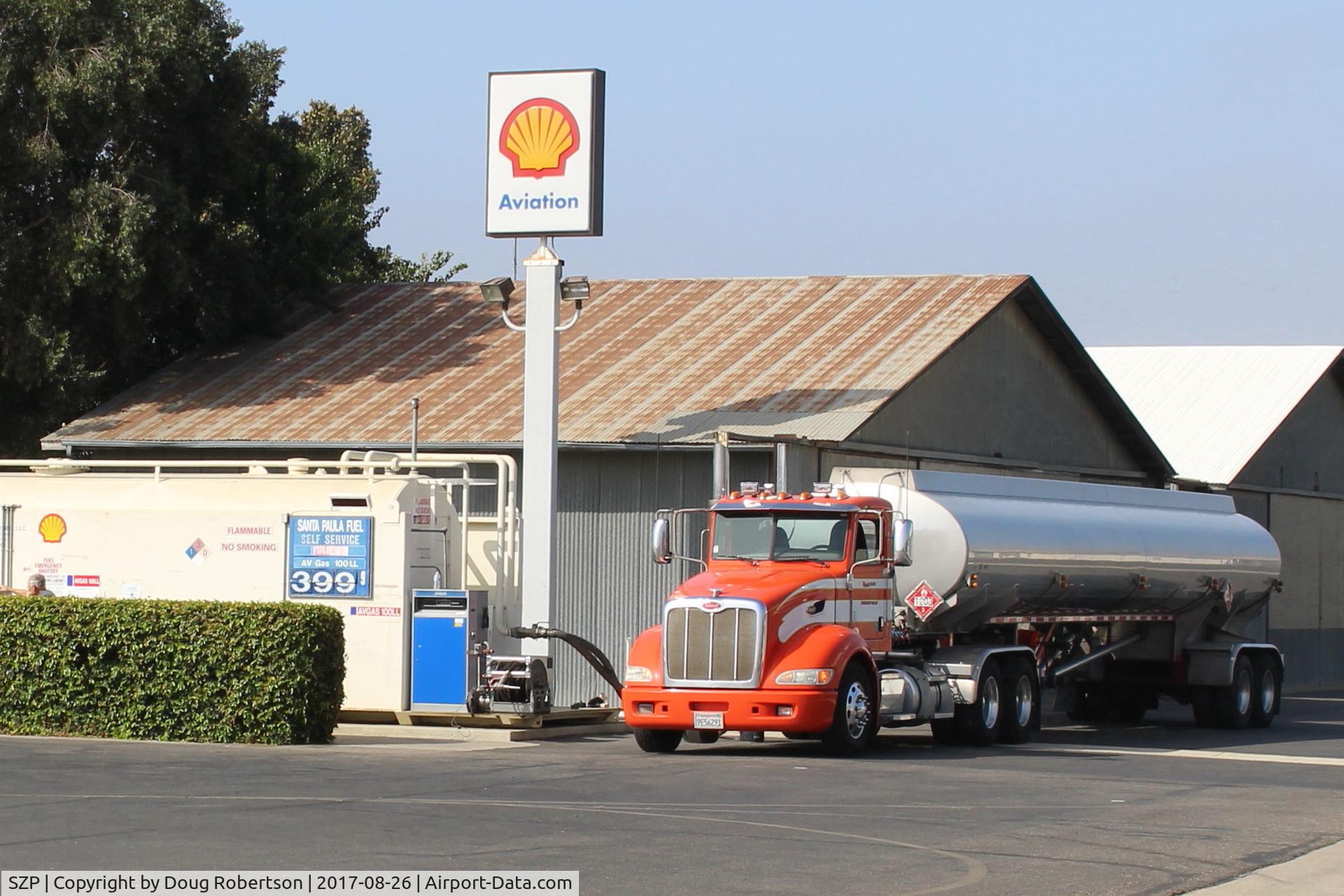 Santa Paula Airport (SZP) - Santa Paula Airport self-serve SHELL AVIATION 100LL fuel dock, being refueled by tanker. Location: Midfield North. No subsequent price change as of several hours later photo taken.. 