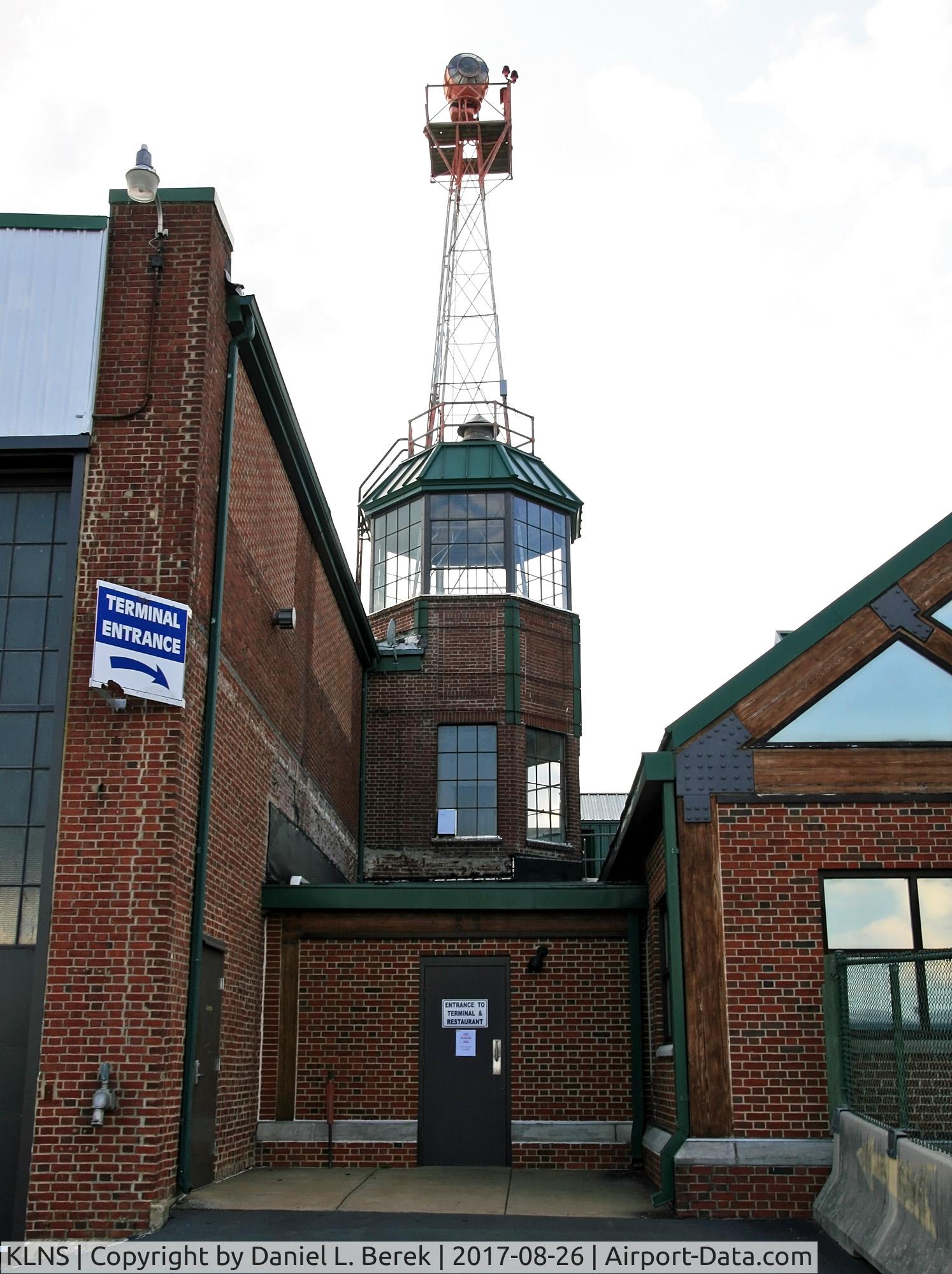 Lancaster Airport (LNS) - The beautiful old tower has been preserved. The new terminal, on the right, was added to the original complex.