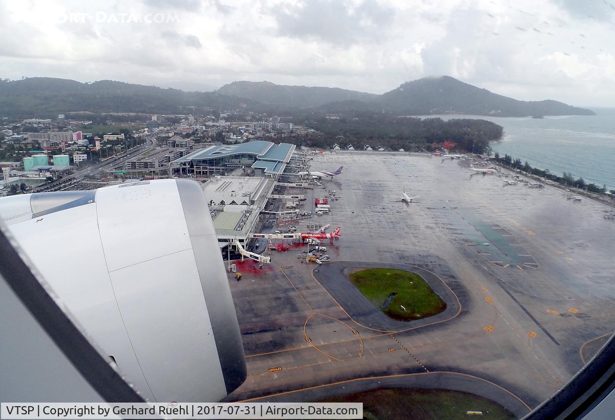 Phuket International Airport, Phuket Thailand (VTSP) - leave Phuket by heavy rain showers to Bangkok
with HS-THD 