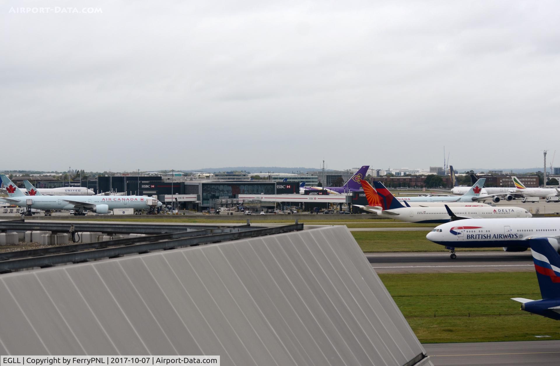 London Heathrow Airport, London, England United Kingdom (EGLL) - Heathrow Terminal 2 seen from T4