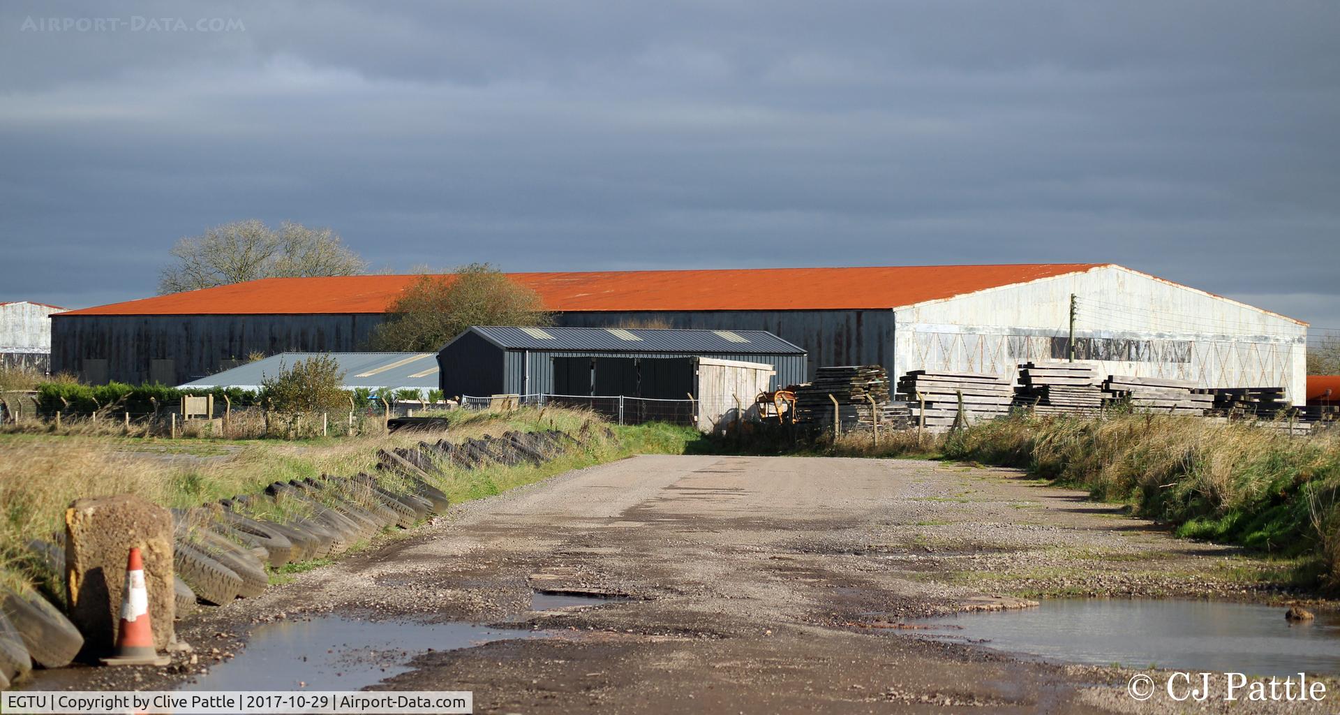 Dunkeswell Aerodrome Airport, Honiton, England United Kingdom (EGTU) - Old hangars on north side of Dunkeswell airfield now used as commercial/industrial premises