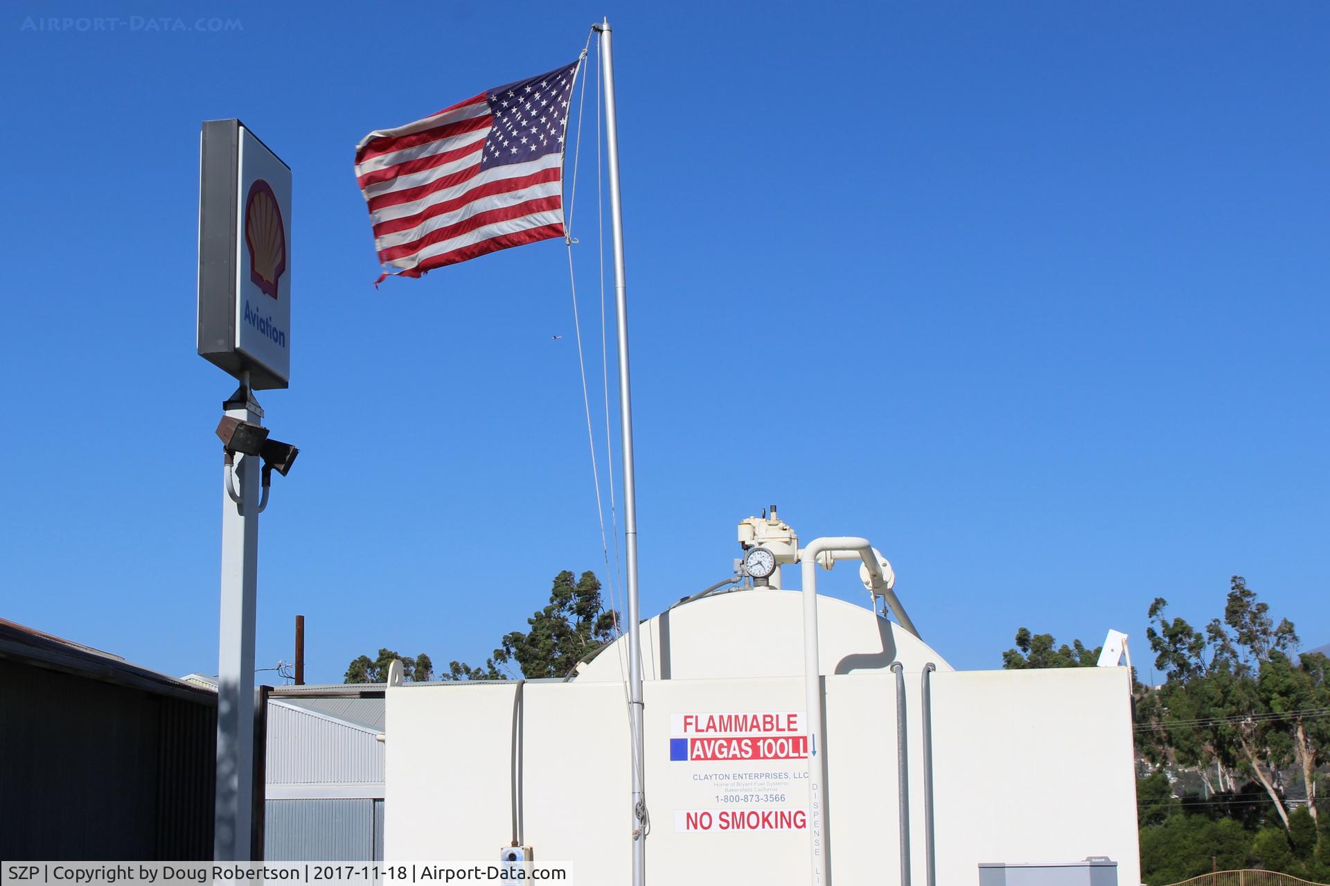 Santa Paula Airport (SZP) - Flag at SZP Fuel Dock showing stiff Santa Ana wind. Rwy 04 in use today.