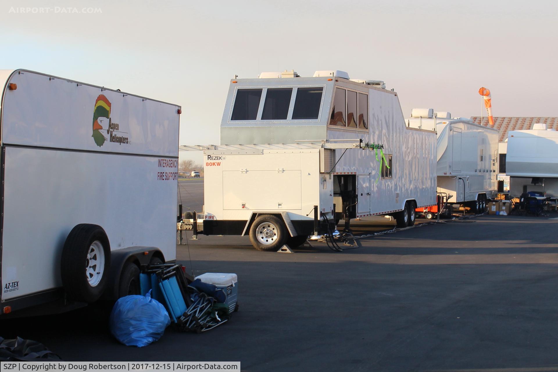 Santa Paula Airport (SZP) - Various support trailers of contractor fire fighters of the extensive, growing Thomas Fire