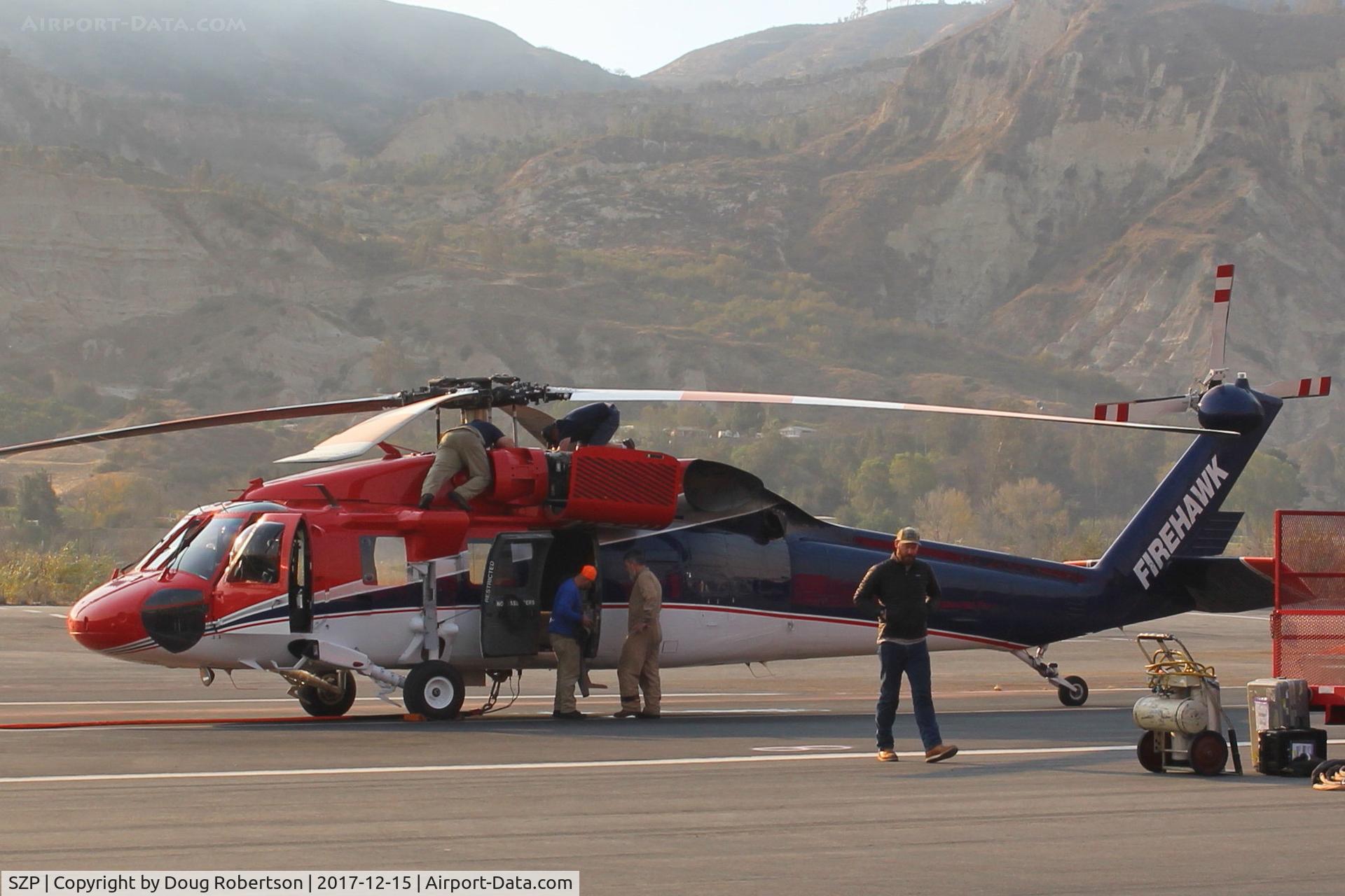 Santa Paula Airport (SZP) - Preparing FireBomber for another sortie-The Thomas Fire