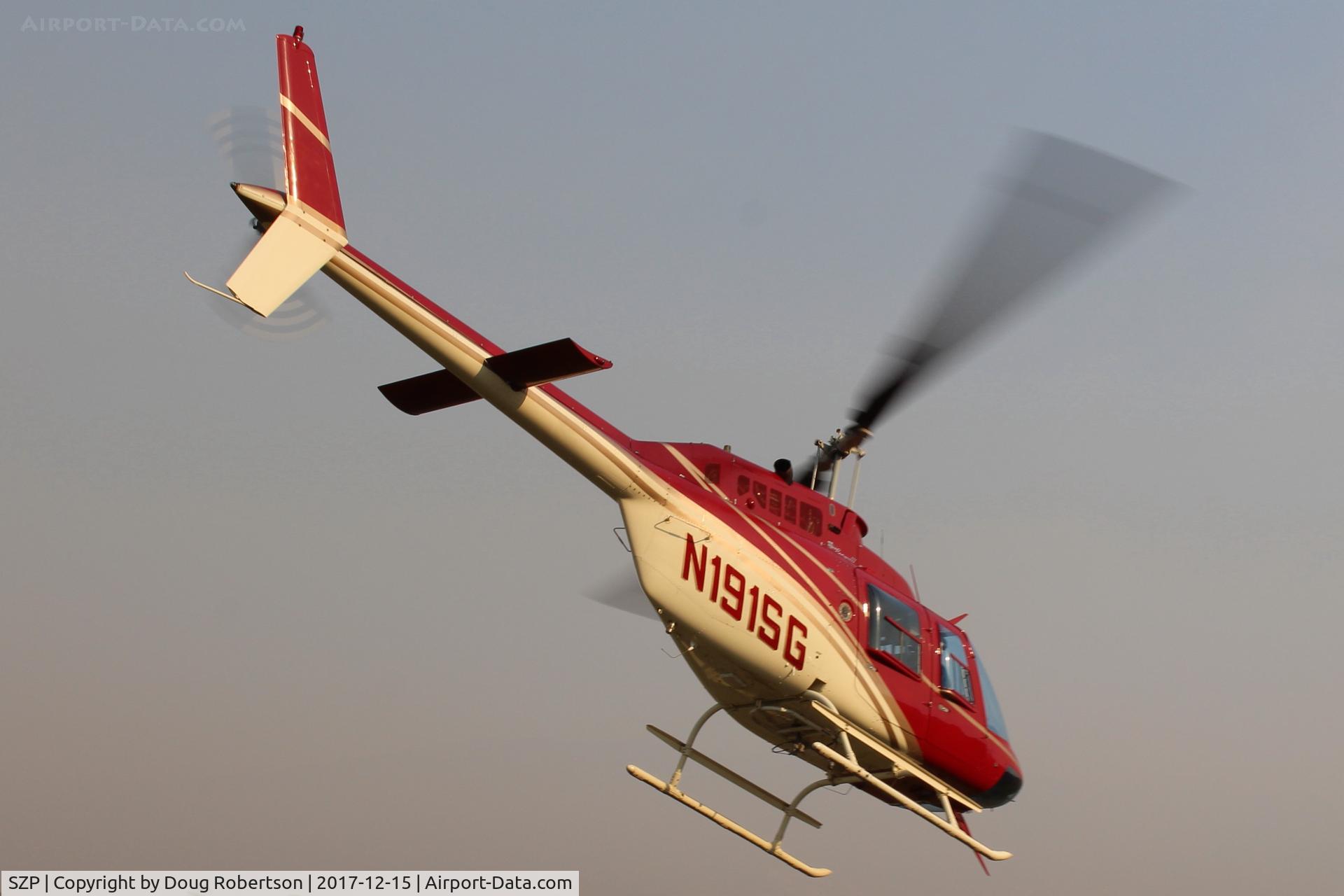 Santa Paula Airport (SZP) - N191SG 1965 Bell 206B JetRanger II, Allison VO-540 Turboshaft 400 SHp, Restricted Forest class, takeoff turning maneuver to the Thomas Fire, note smoky sky.
