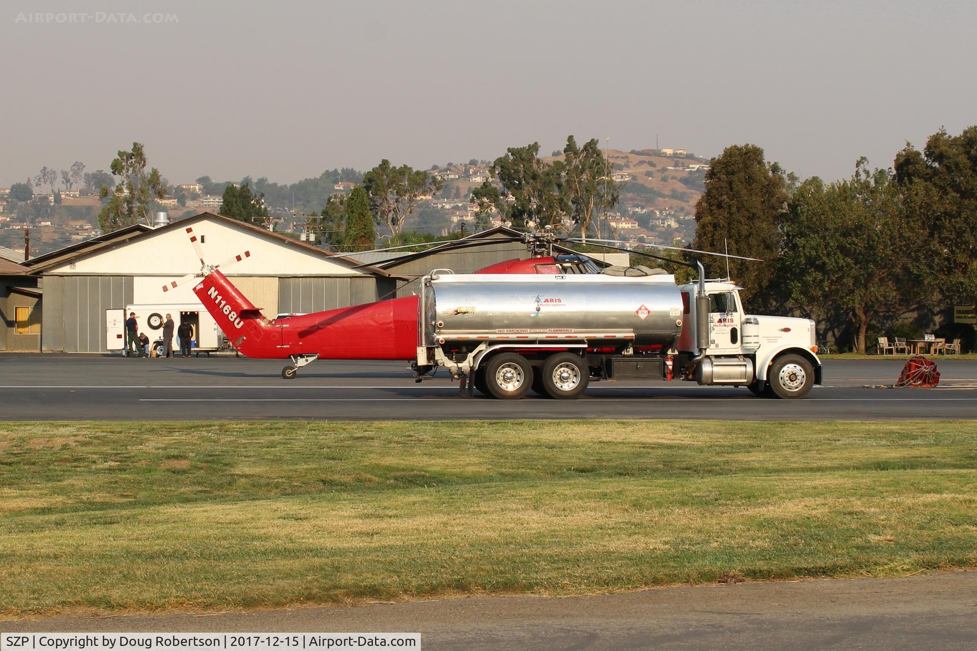 Santa Paula Airport (SZP) - N1168U 1958 Sikorsky S-58ET, Pratt & Whitney(C)PT6T-3 1,875 SHp Turbo Prop Fire Bomber, being serviced. Note smoky sky.  