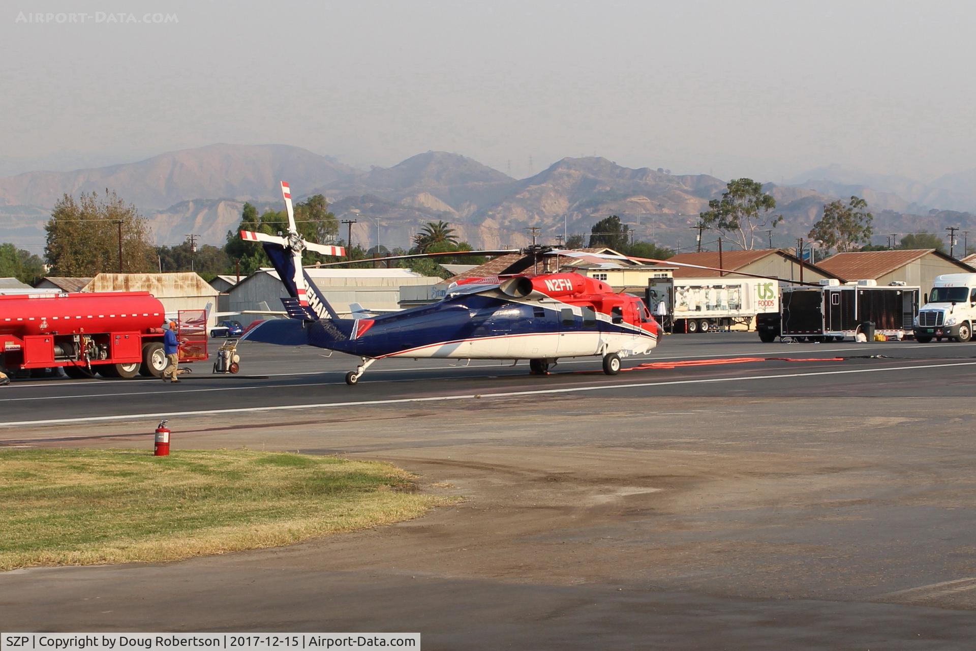 Santa Paula Airport (SZP) - N2FH 1986 Sikorsky S-70C THUNDERHAWK FIREHAWK, two 1,690 SHp GE T700-GE-401 Turboshafts, at Thomas Fire firebase. Note smoky air.
