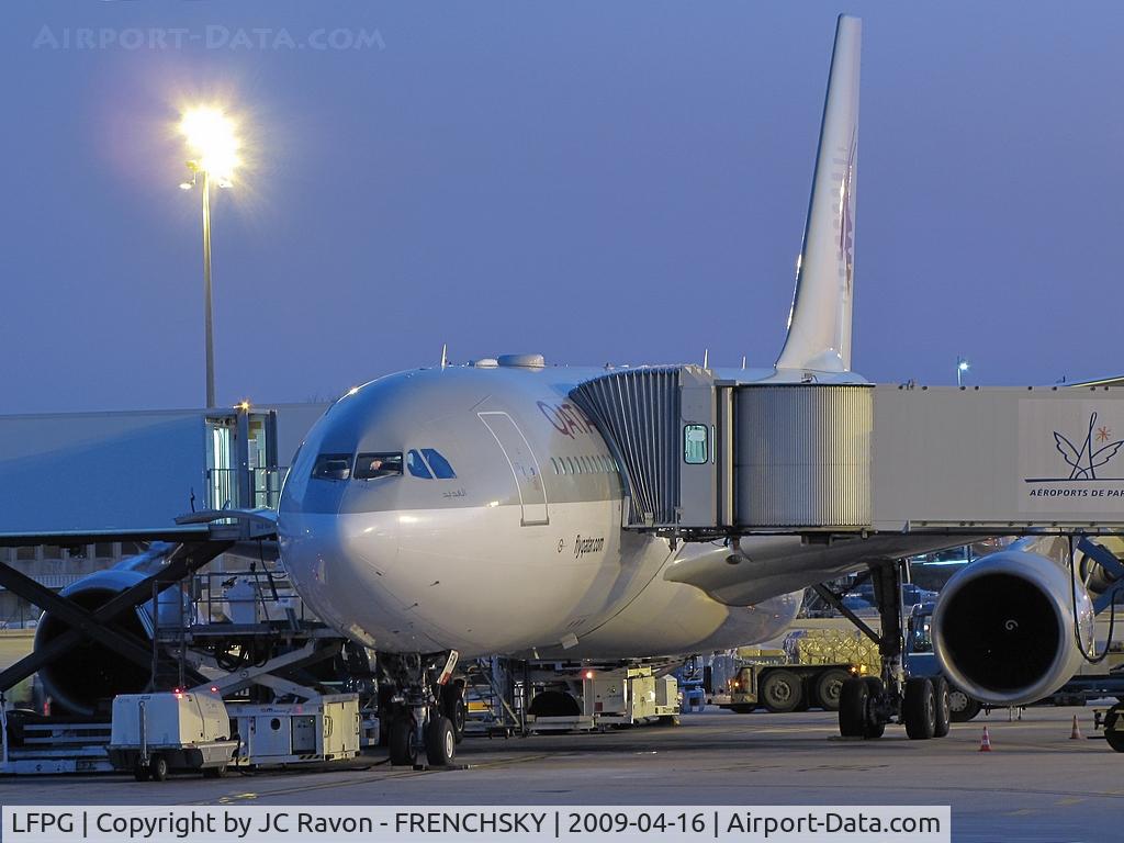 Paris Charles de Gaulle Airport (Roissy Airport), Paris France (LFPG) - night at CDG terminal 1 hub Qatar Airways parking Uniform 7