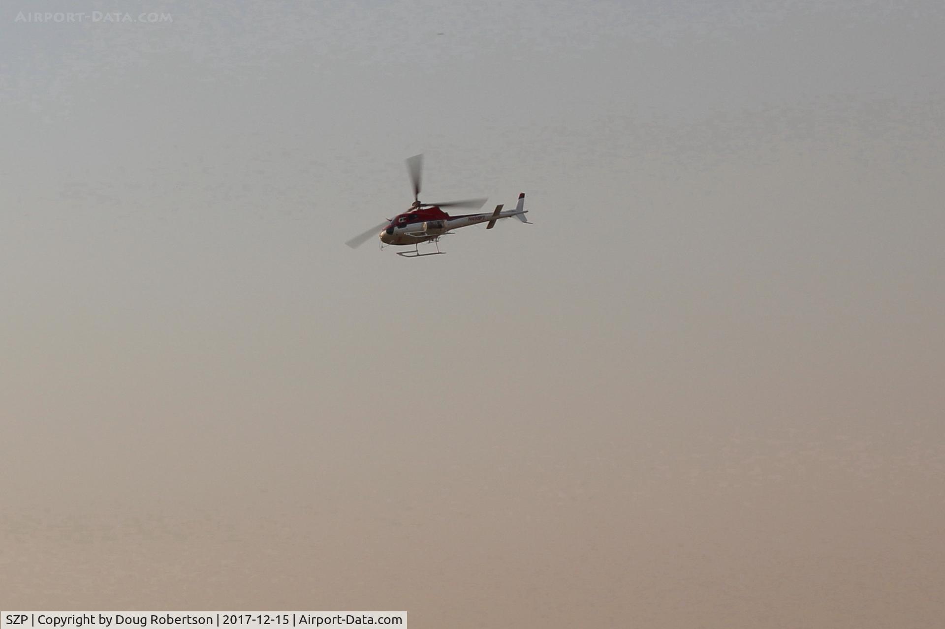 Santa Paula Airport (SZP) - UNKNOWN-N number does not reveal/compute, Thomas Fire firefighting Helicopter, departing SZP fire base. Note smoky sky