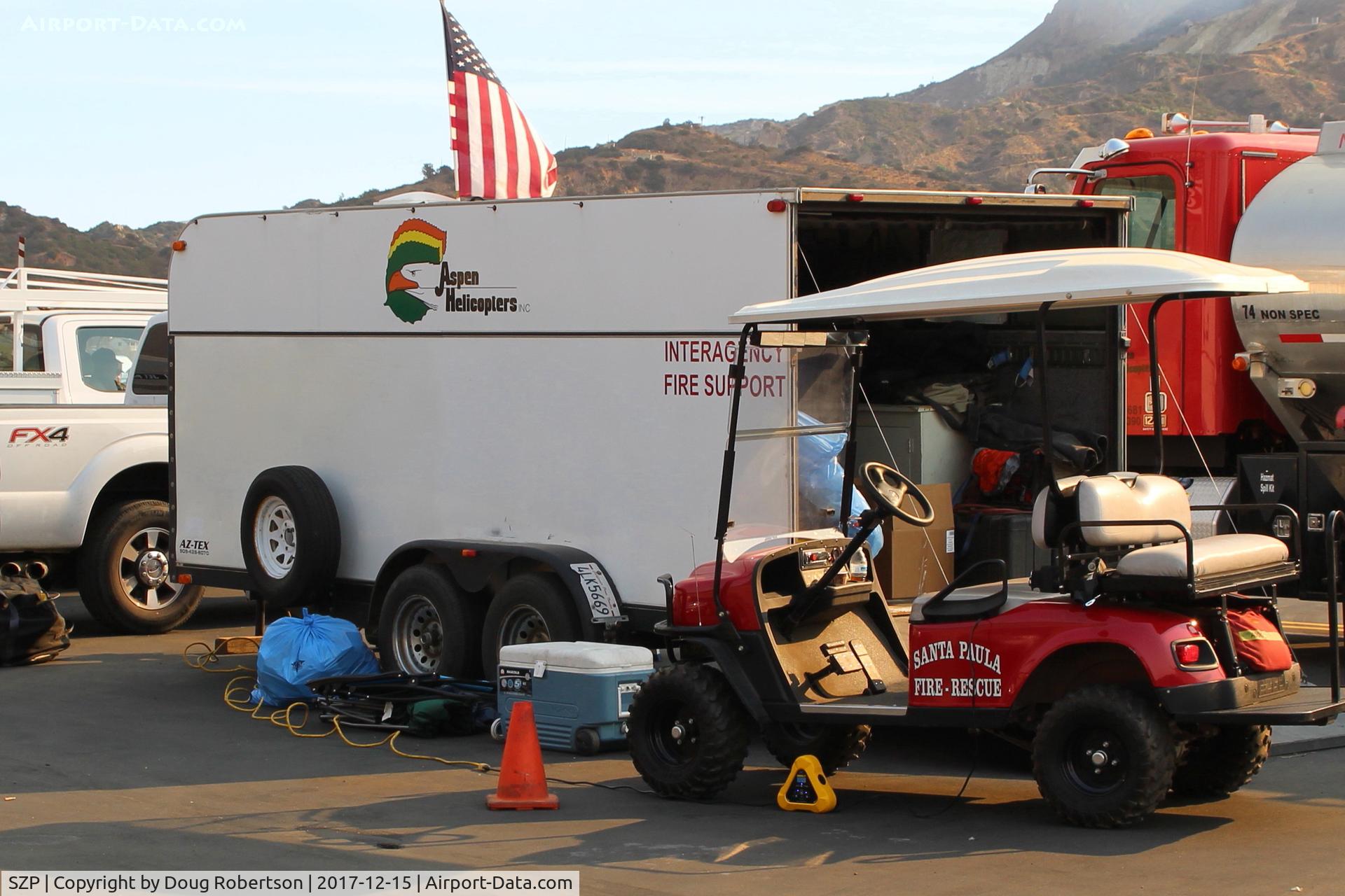 Santa Paula Airport (SZP) - Support vehicles for the SZP Firebase; the Aspen Helicopters equipment is based at the nearby Oxnard Airport, OXR. The Thomas Fire started in NE Santa Paula area on eve of 4 December, 2017, so-named from the Thomas Aquinas College there.