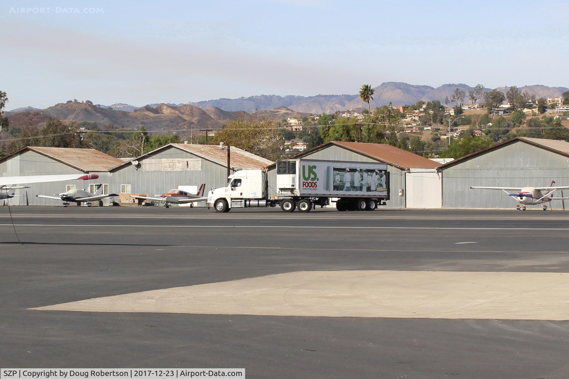 Santa Paula Airport (SZP) - SZP Thomas Fire FireBase FireFighter's Food Support truck departing last vestige of firebase remaining, making U-turn in sufficient clearing. Note smoky air, photo taken-19th day of fire.