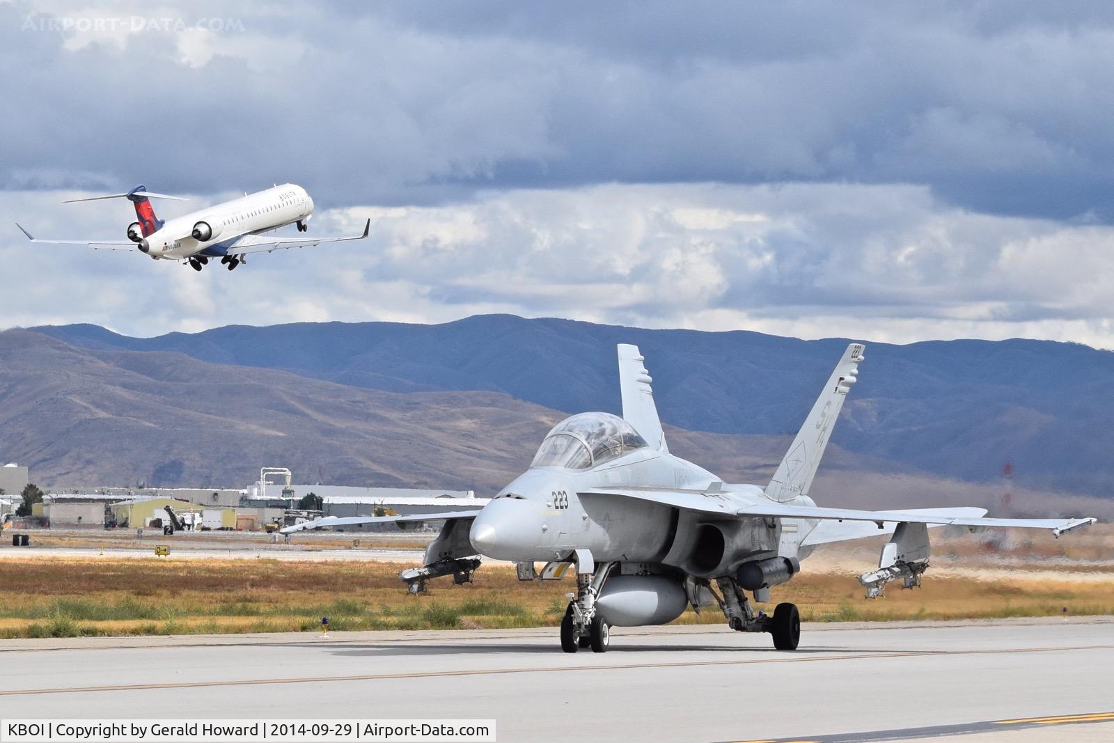 Boise Air Terminal/gowen Fld Airport (BOI) - BOI sometimes has a nice mix of military and commercial aircraft. F/A-18D on Taxiway Bravo is from VMFAT-101, NAS Miramar, CA.