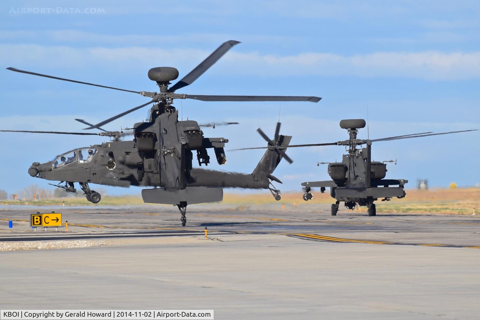 Boise Air Terminal/gowen Fld Airport (BOI) - AH-64s from the 1-183rd AVN BN, Idaho Army National Guard forming up on Taxiway Bravo.
