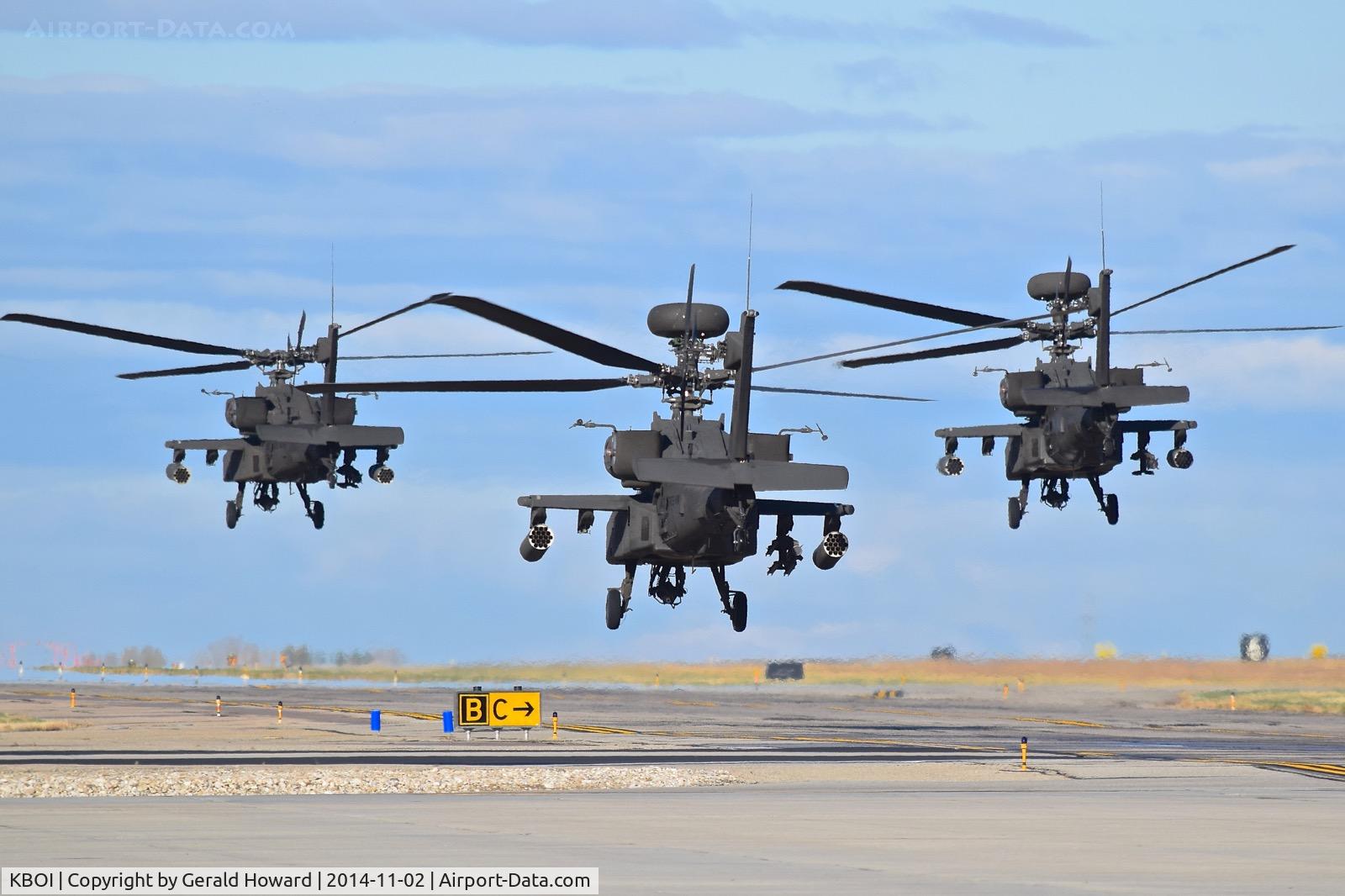 Boise Air Terminal/gowen Fld Airport (BOI) - AH-64s from the 1-183rd AVN BN, Idaho Army National Guard departing Taxiway Bravo.
