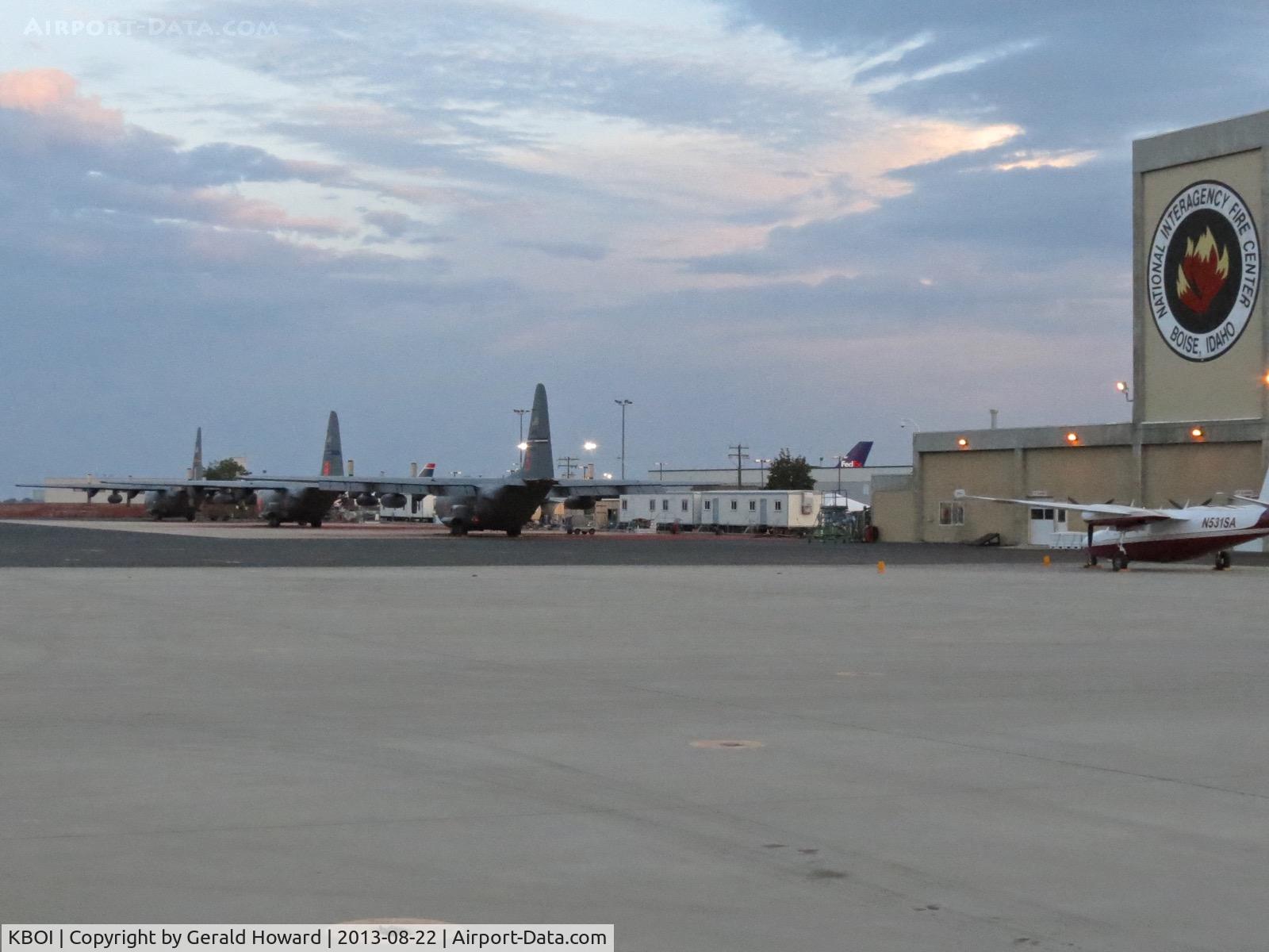 Boise Air Terminal/gowen Fld Airport (BOI) - Three C-130H  from three different squadrons working on the NIFC ramp.