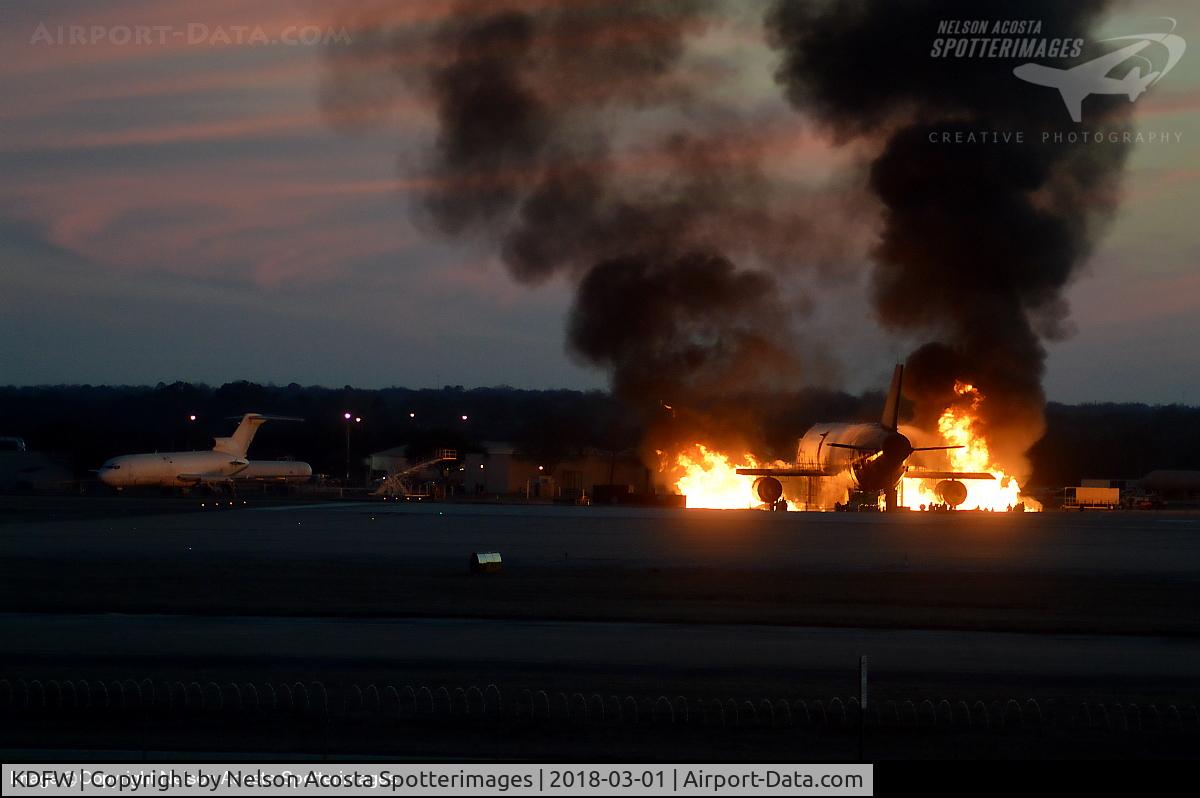 Dallas/fort Worth International Airport (DFW) - Fire training at the SW side of the airfield.