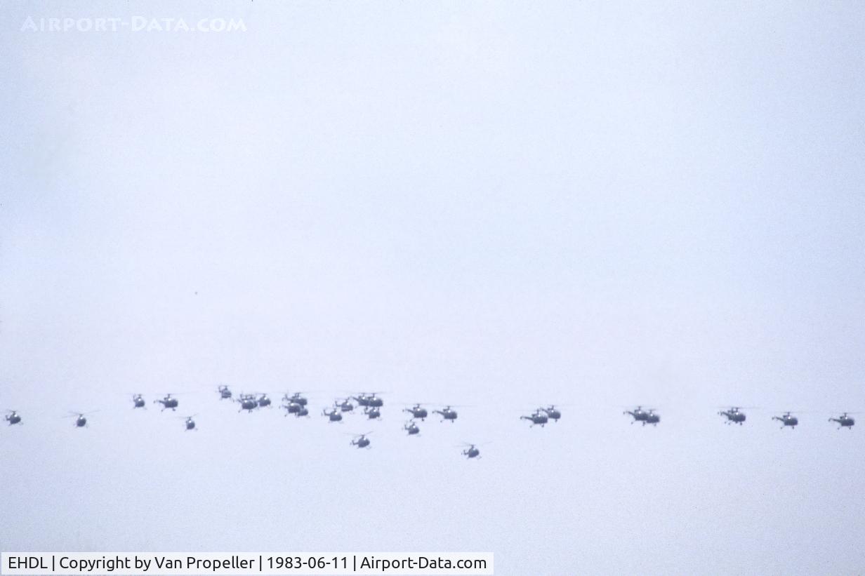Deelen Airbase Airport, Deelen Netherlands (EHDL) - The 1983 Open Day of Deelen Air Base featured this mass formation of Royal Netherlands Air Force helicopters, consisting of Sud aviation SE3160 Alouette IIIs and Bölkow Bo 105Cs.